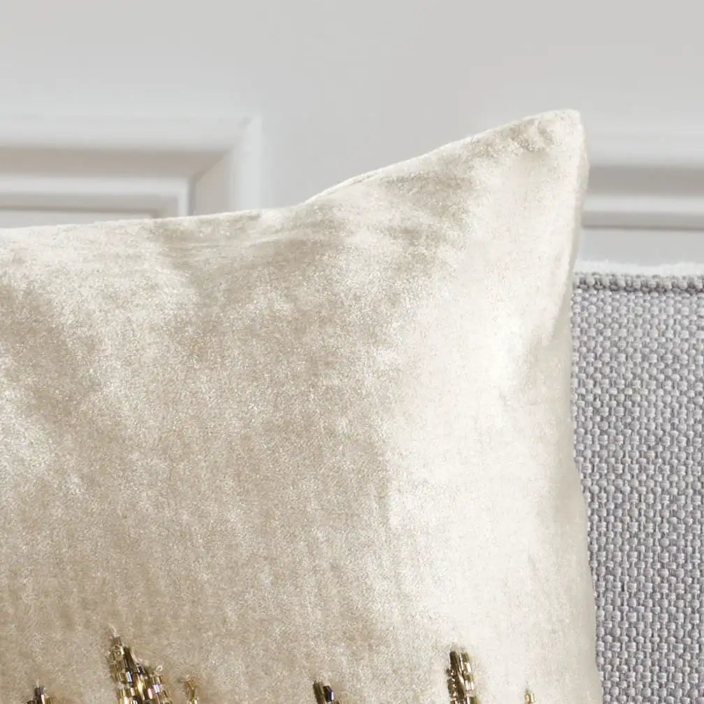 Deston Darling Pillow in Beige / Gold in a styled room