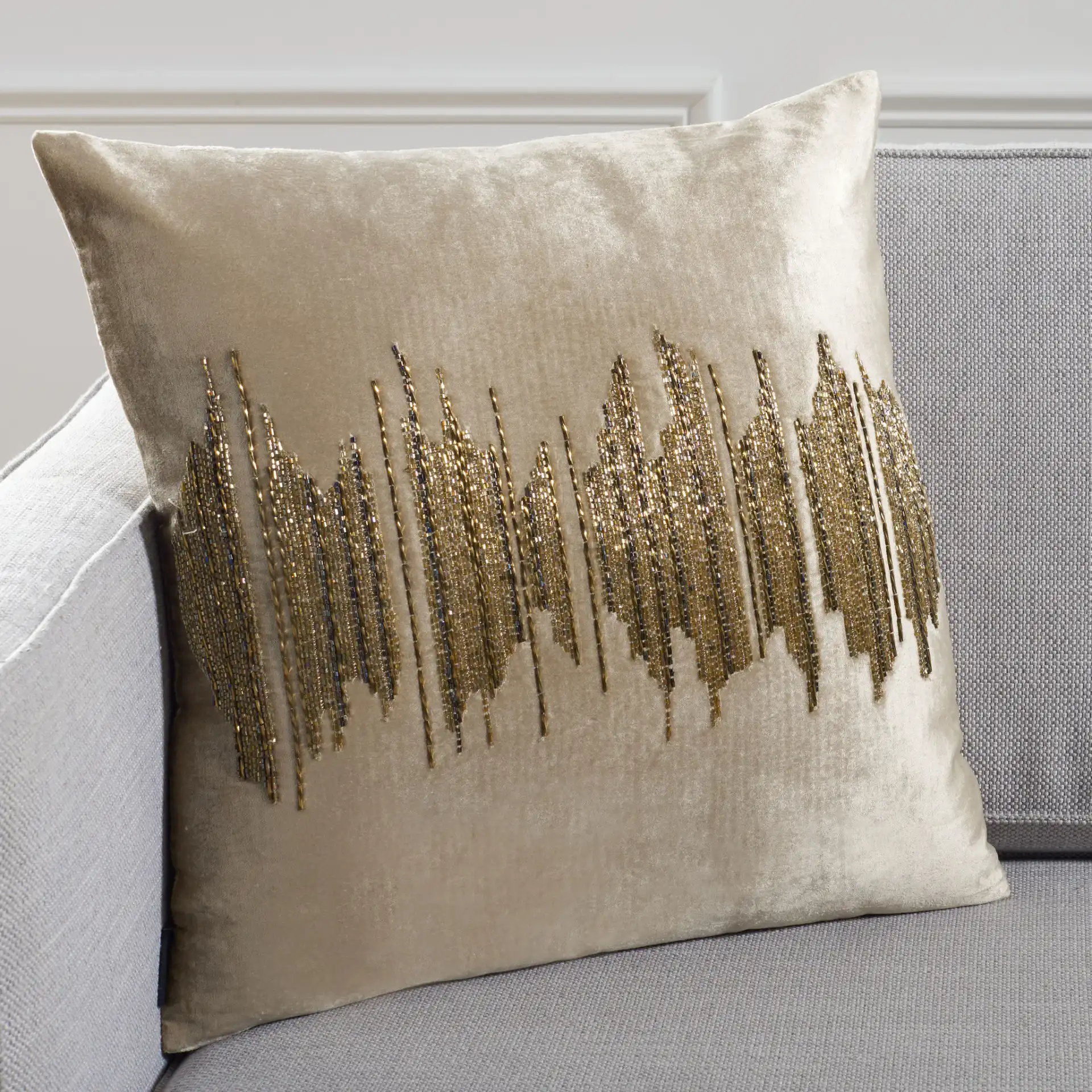 Deston Darling Pillow in Beige / Gold in a styled room