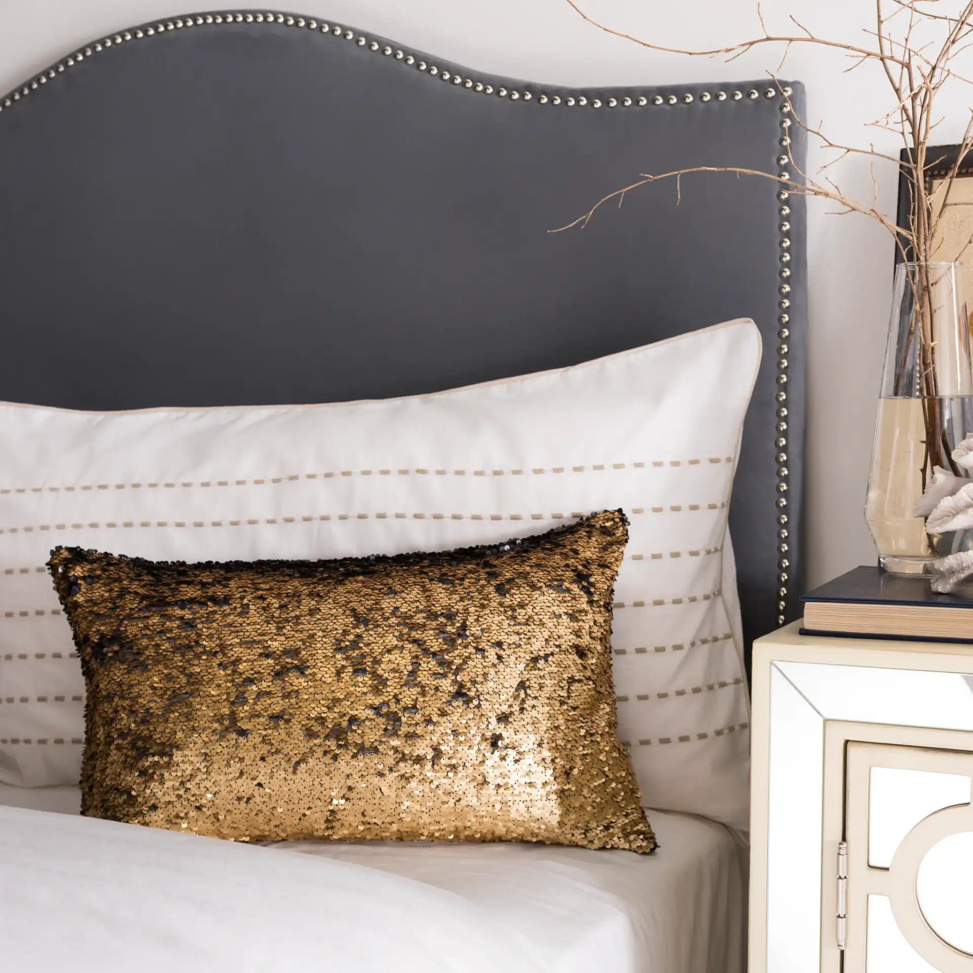 Talon Two-Tone Pillow in Gold in a styled room