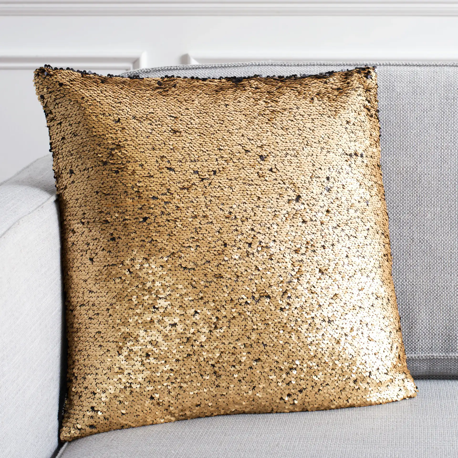 Talon Two-Tone Pillow in Gold in a styled room