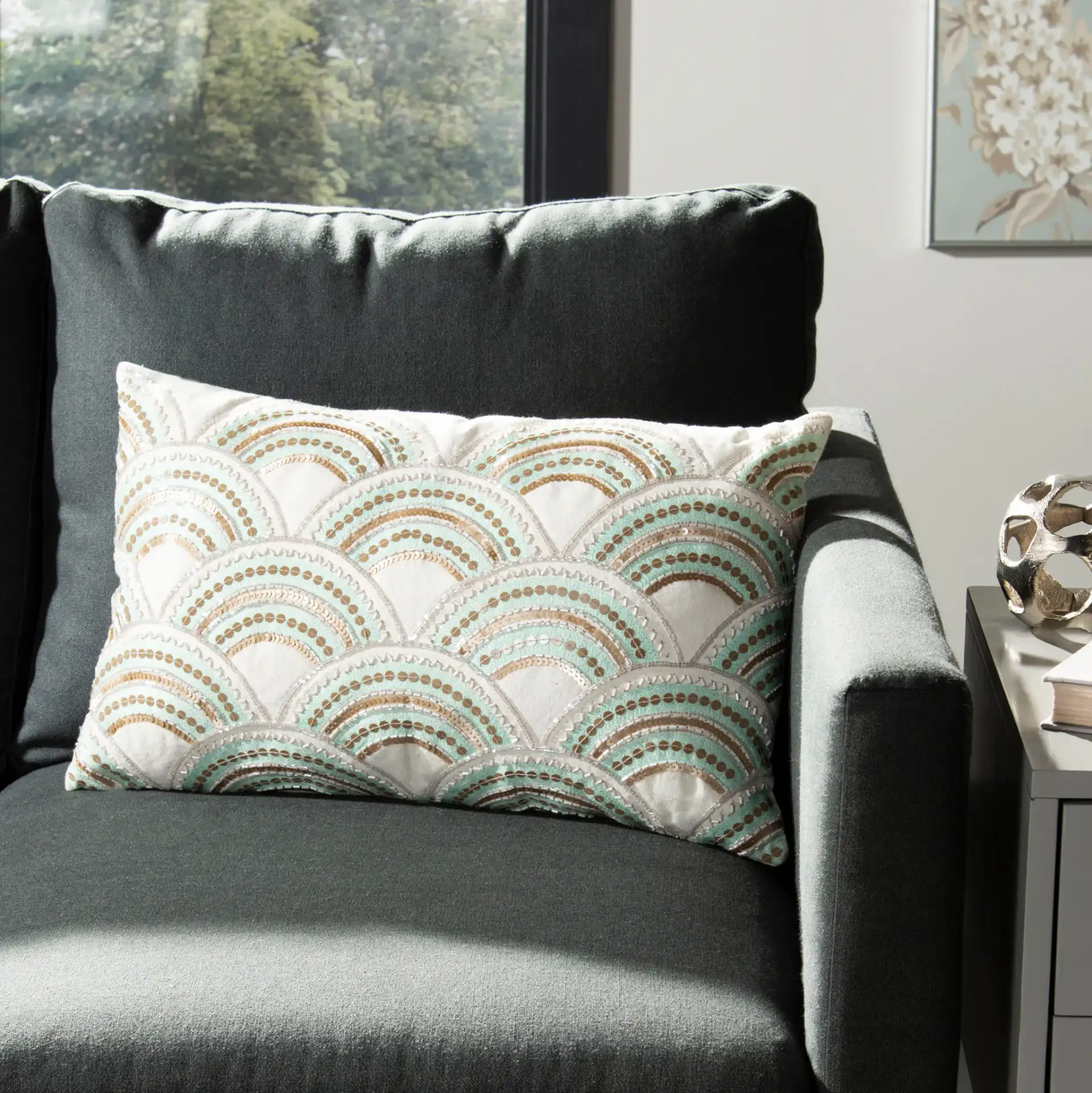 Kadri Pillow in Beige / Teal / Gold in a styled room