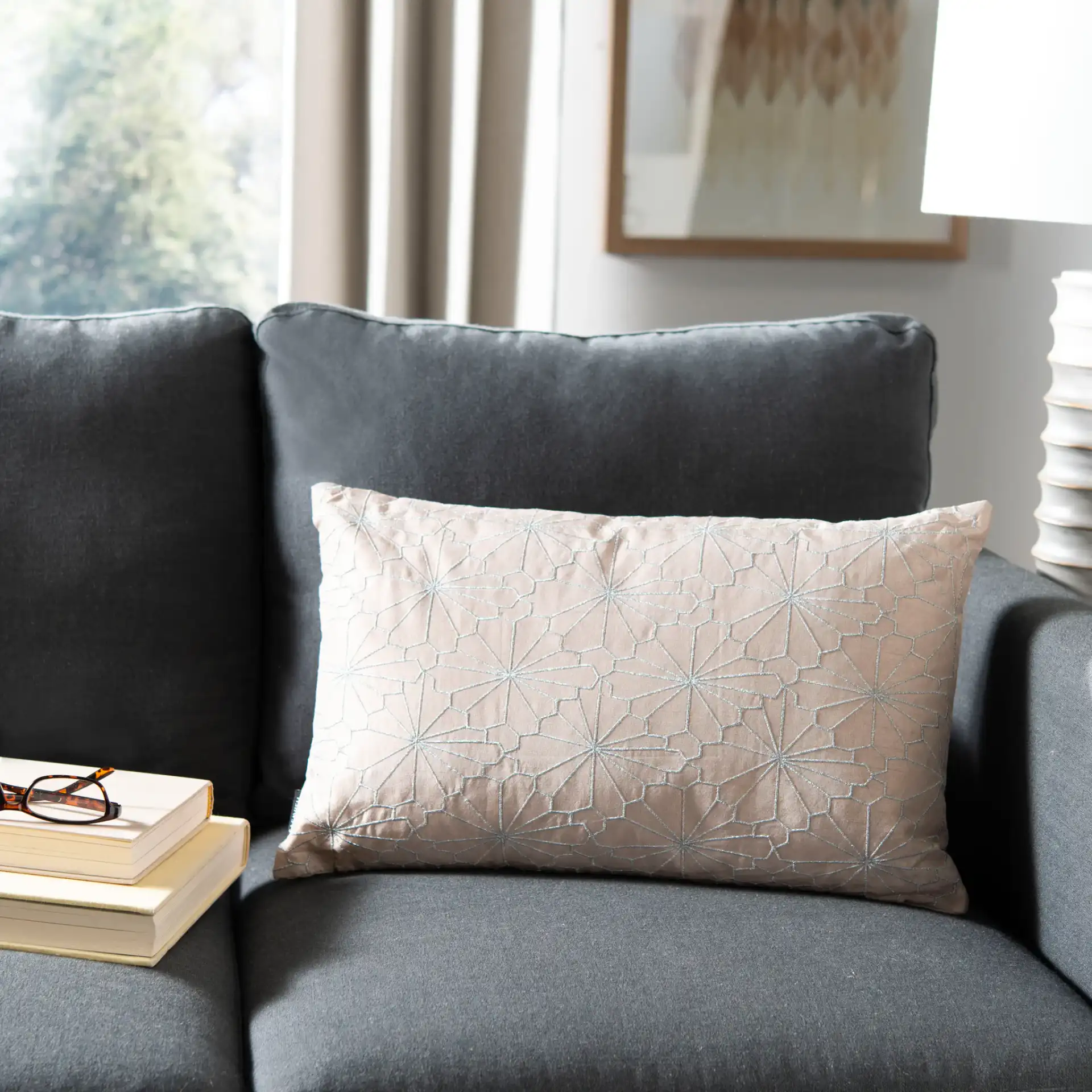 Nisha Pillow in Champagne / Silver in a styled room