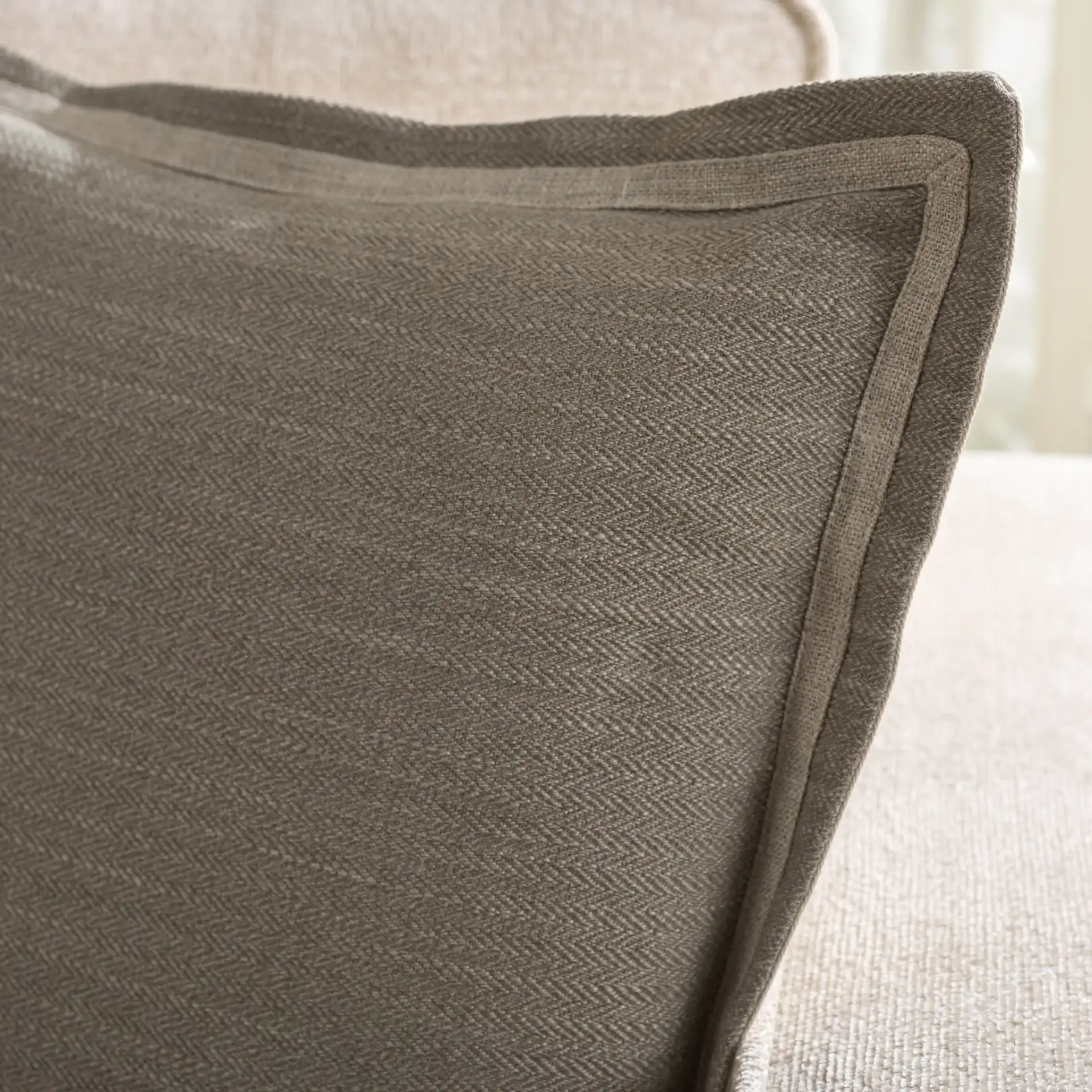 Jinnie Pillow in Dark Taupe in a styled room