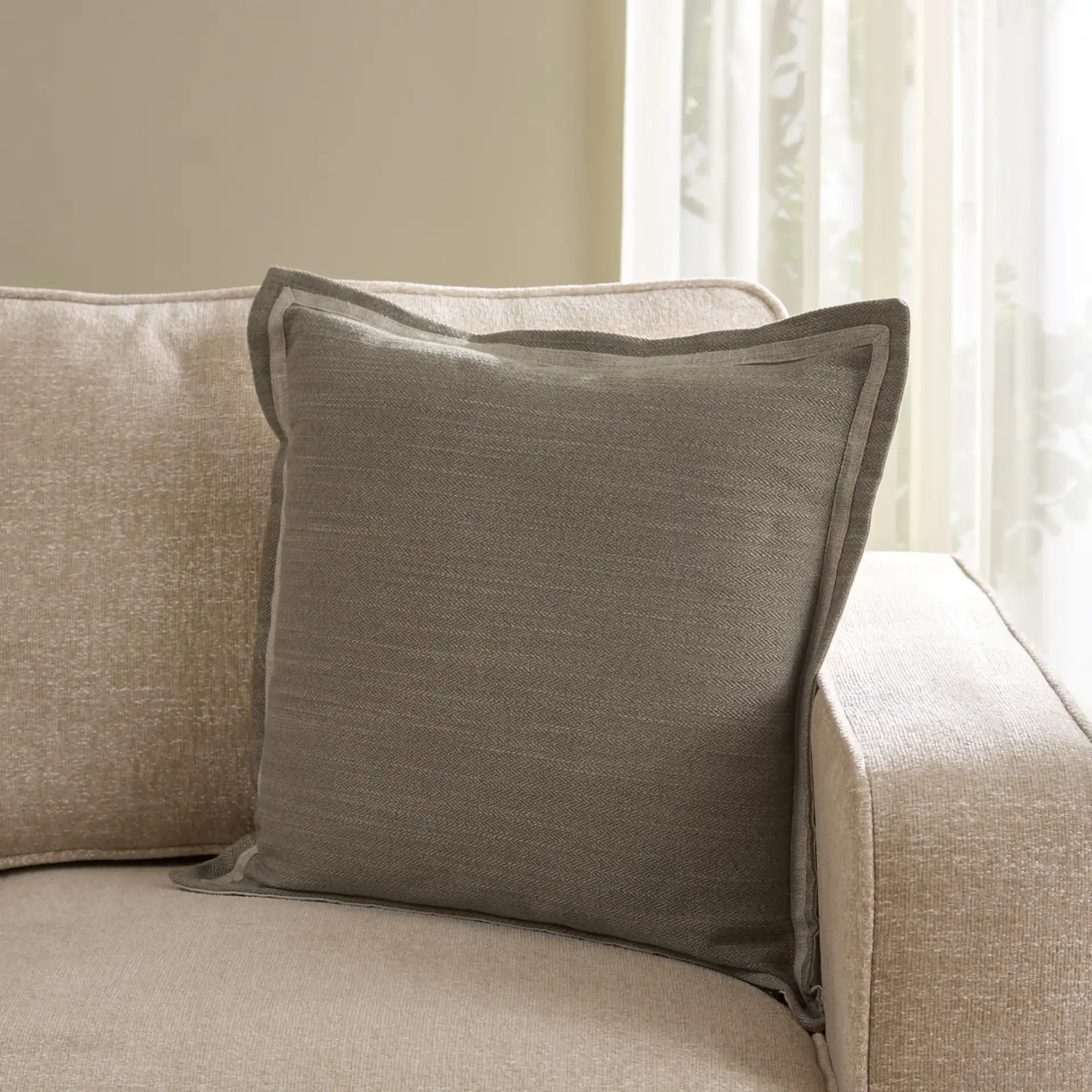 Jinnie Pillow in Dark Taupe in a styled room