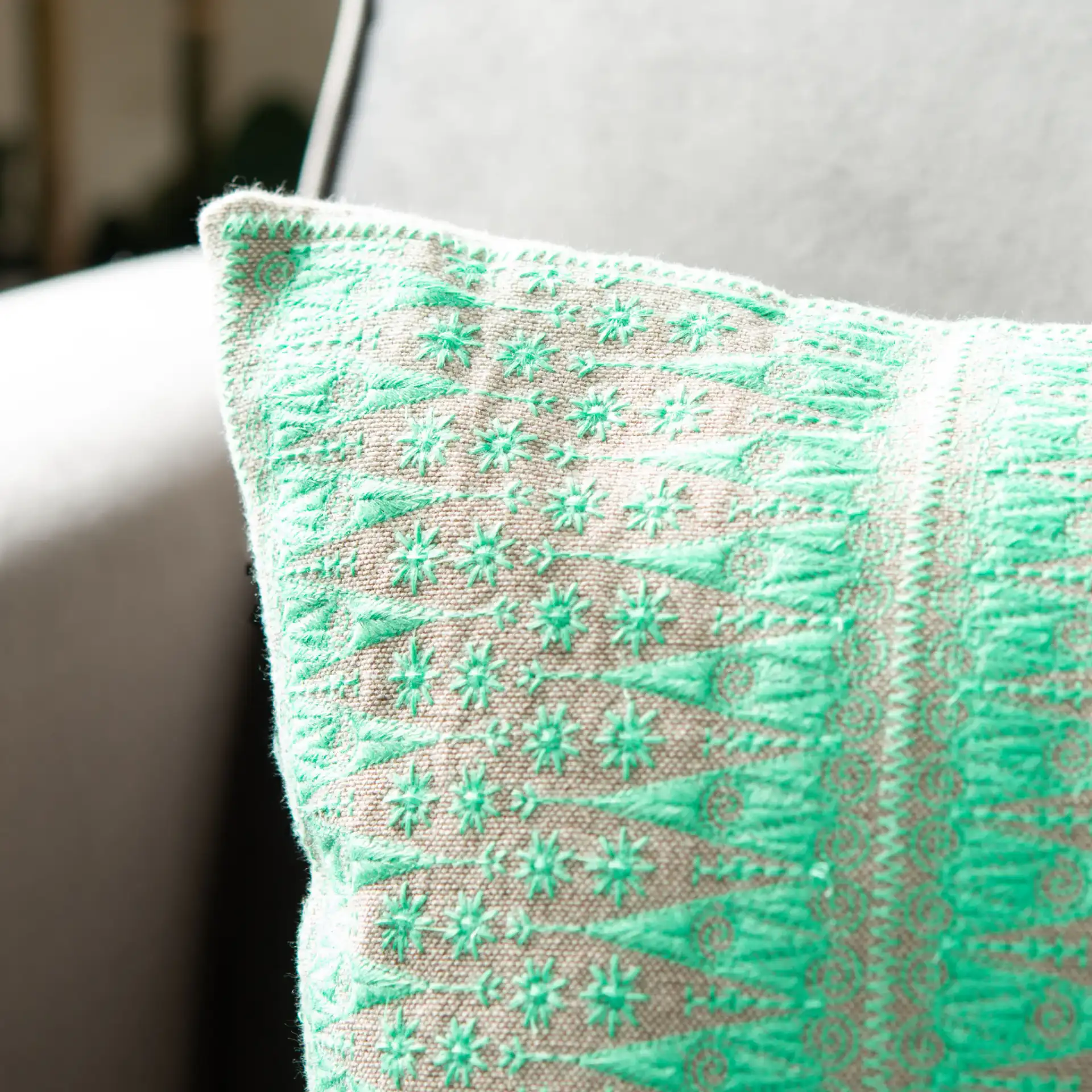Parvin Pillow in Teal / Beige in a styled room