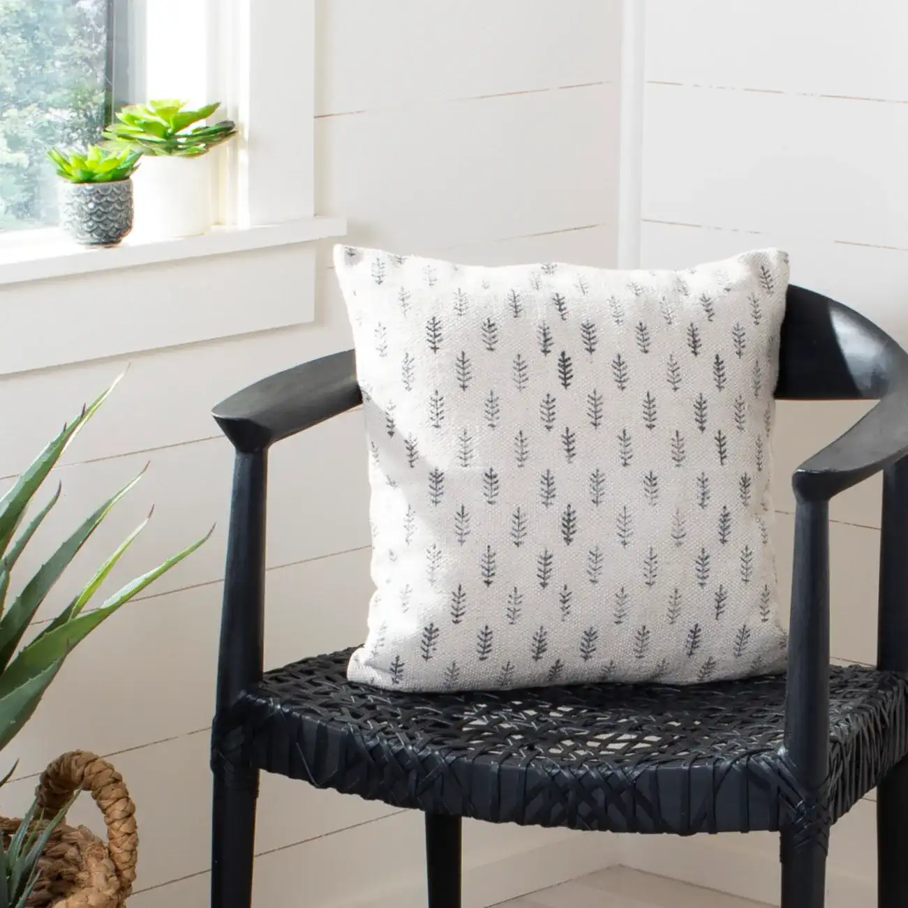 Fanla Pillow in Black / White in a styled room