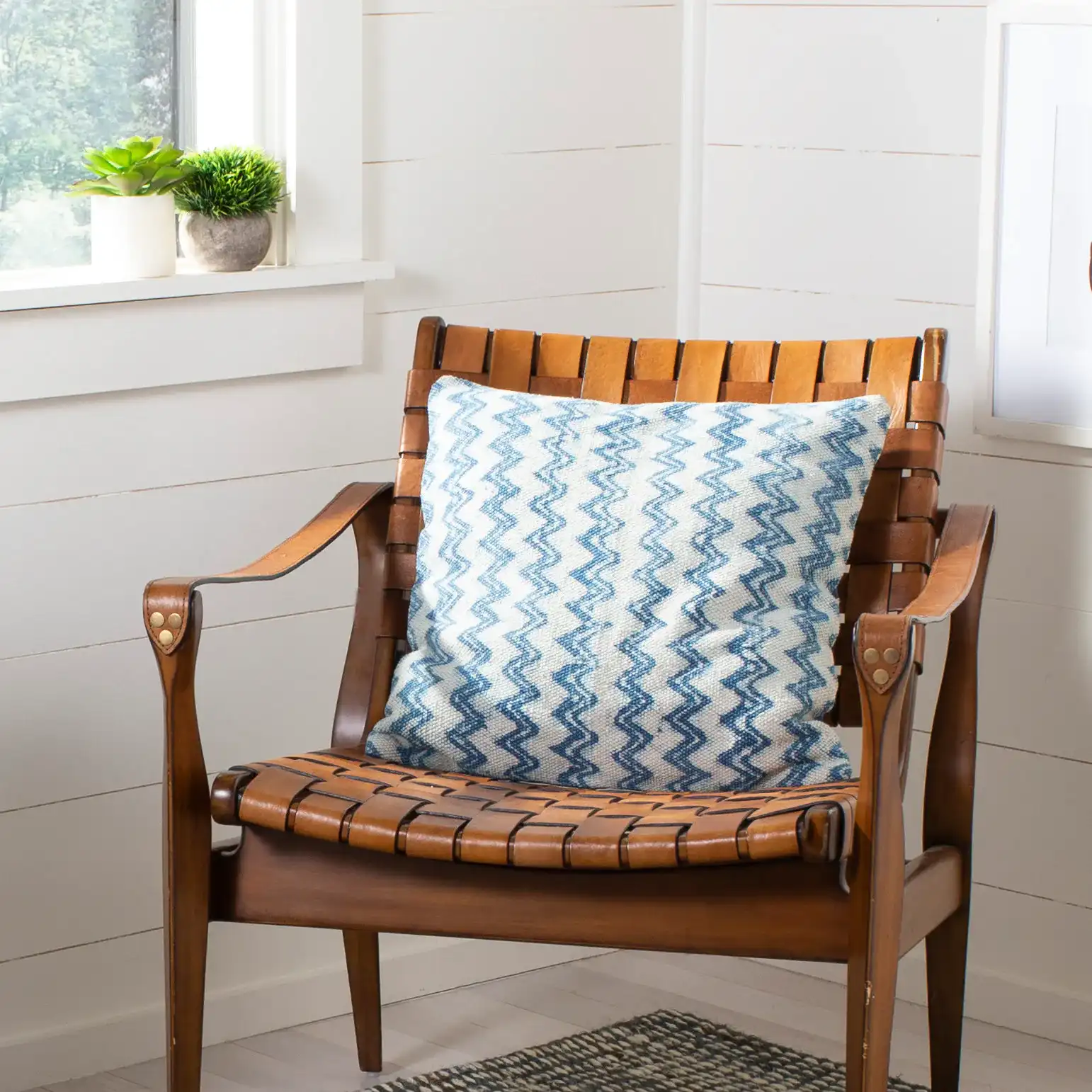 Merly Pillow in Indigo in a styled room