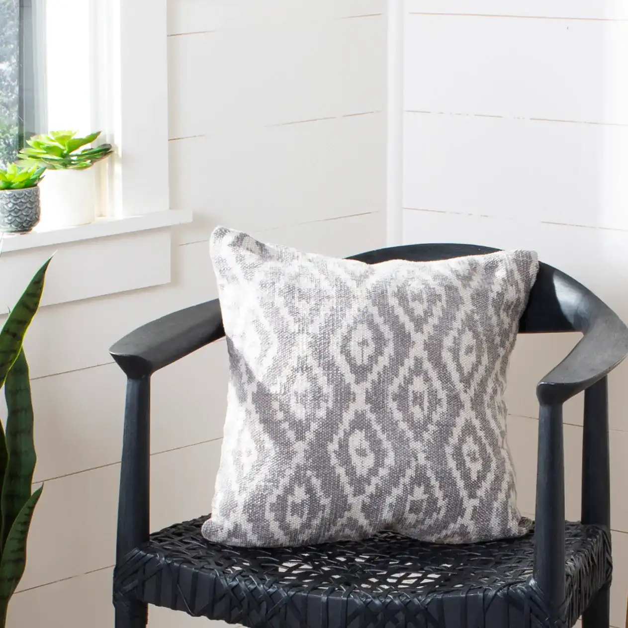 Benzon Pillow in Beige / Cream in a styled room