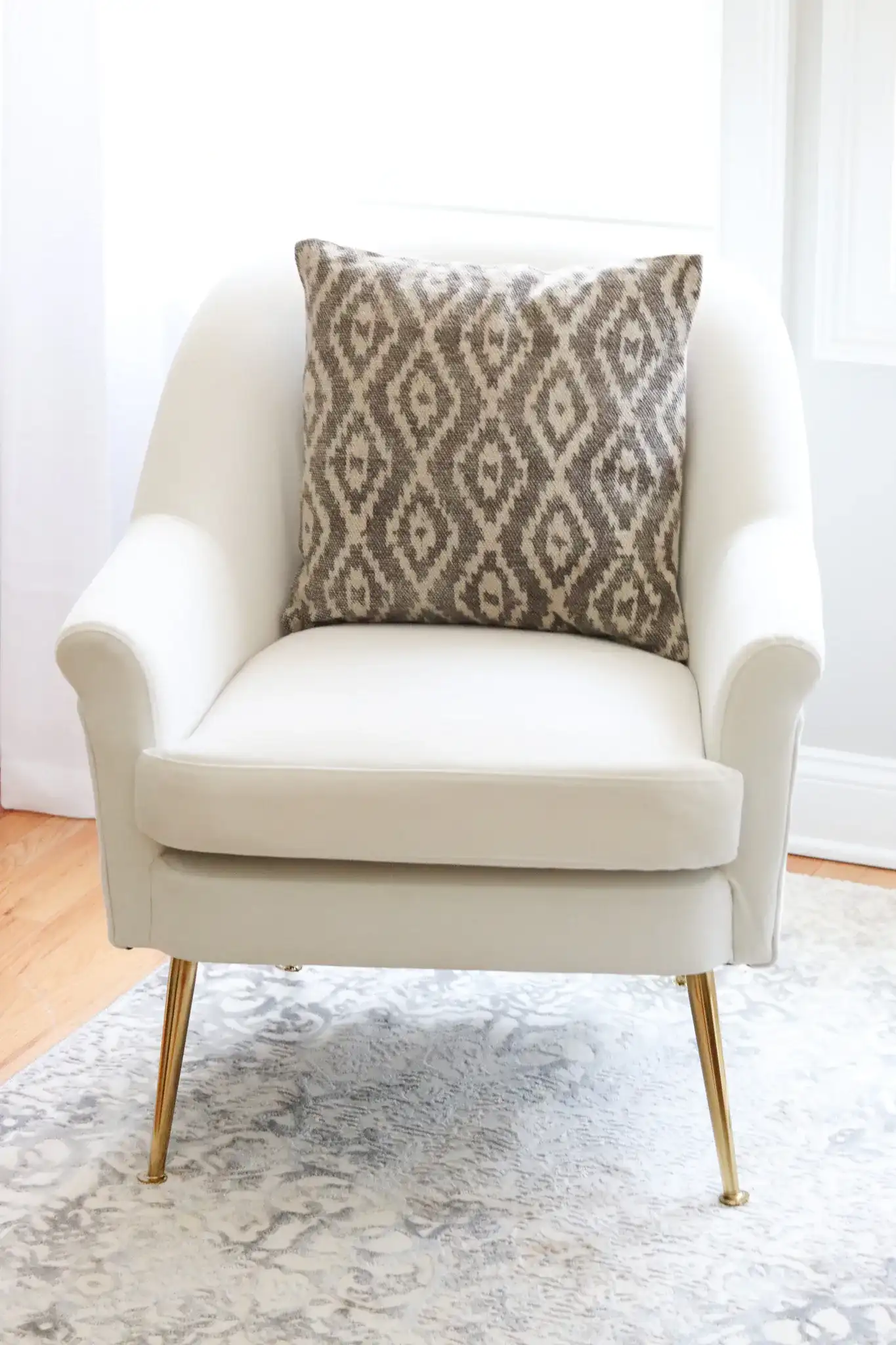 Benzon Pillow in Beige / Cream in a styled room