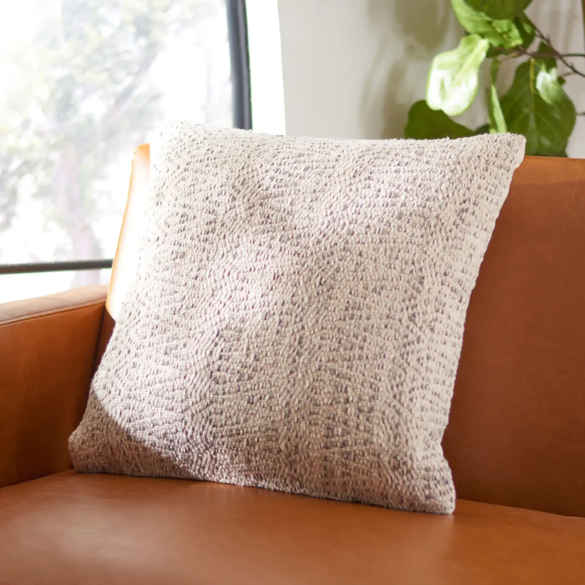 Parvati Pillow in Silver in a styled room