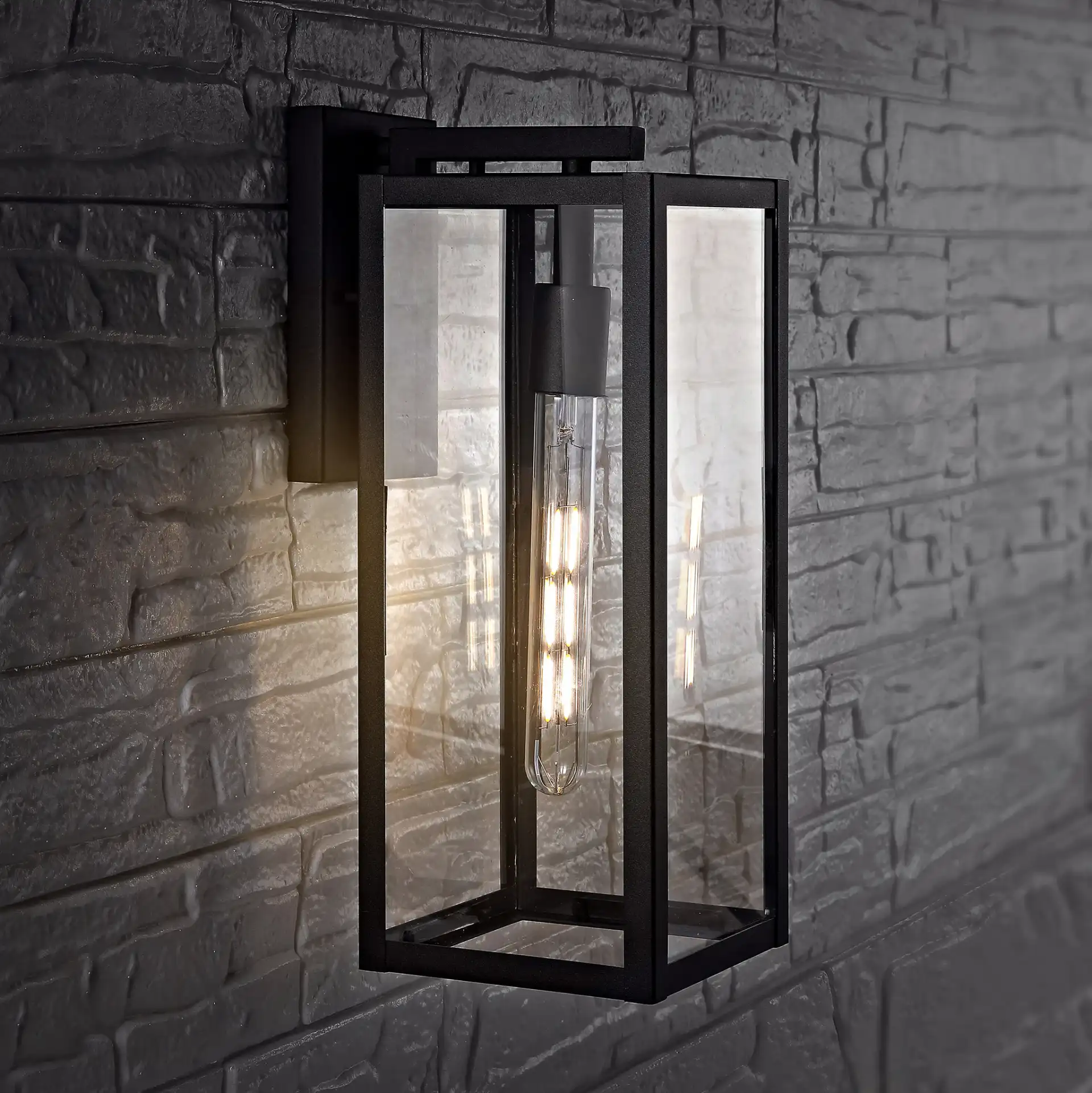 Welson Outdoor Wall Lantern in Black in a styled room