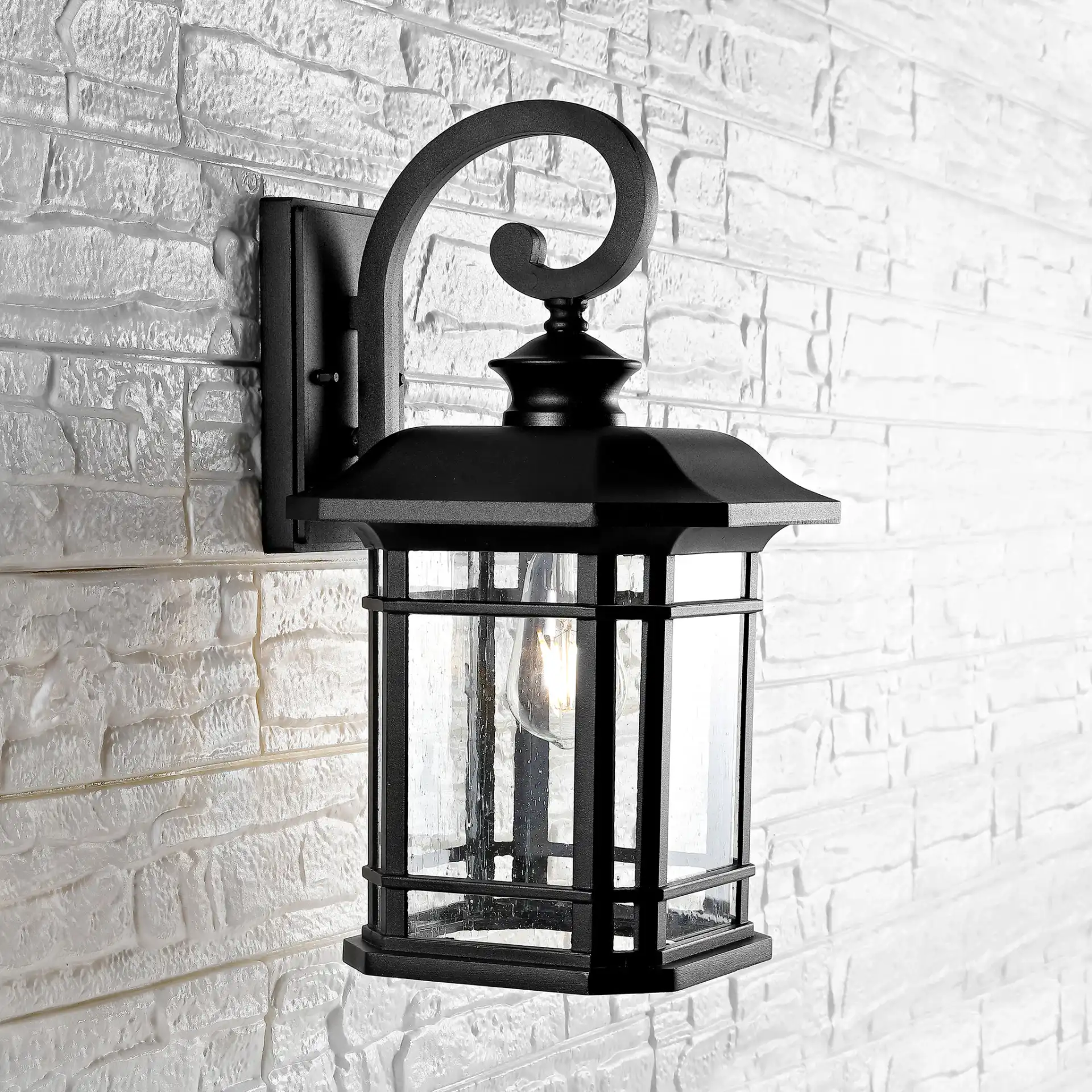 Cendra Outdoor Wall Lantern in Black in a styled room
