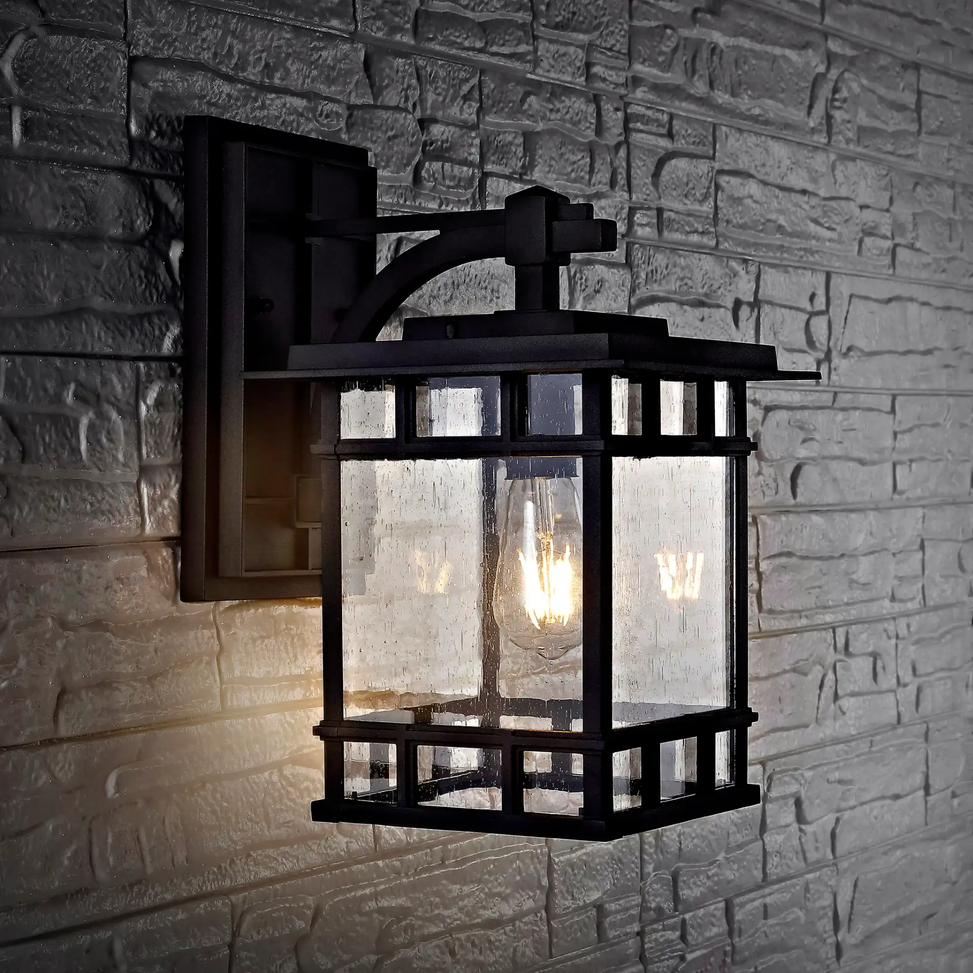 Rolran Outdoor Wall Lantern in Black in a styled room