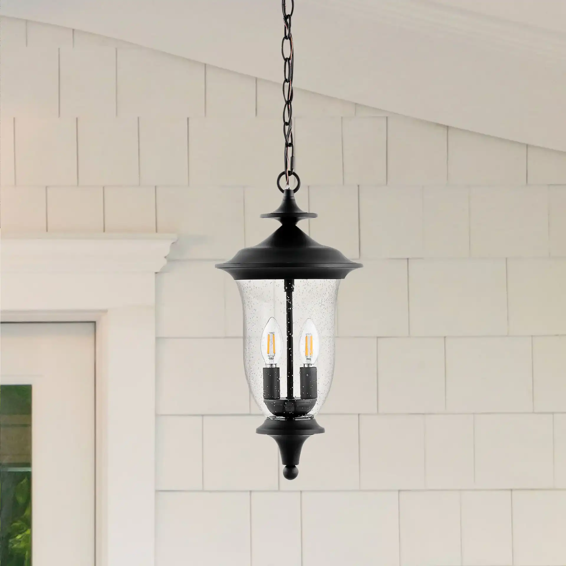 Dowell Outdoor Pendant in Black in a styled room