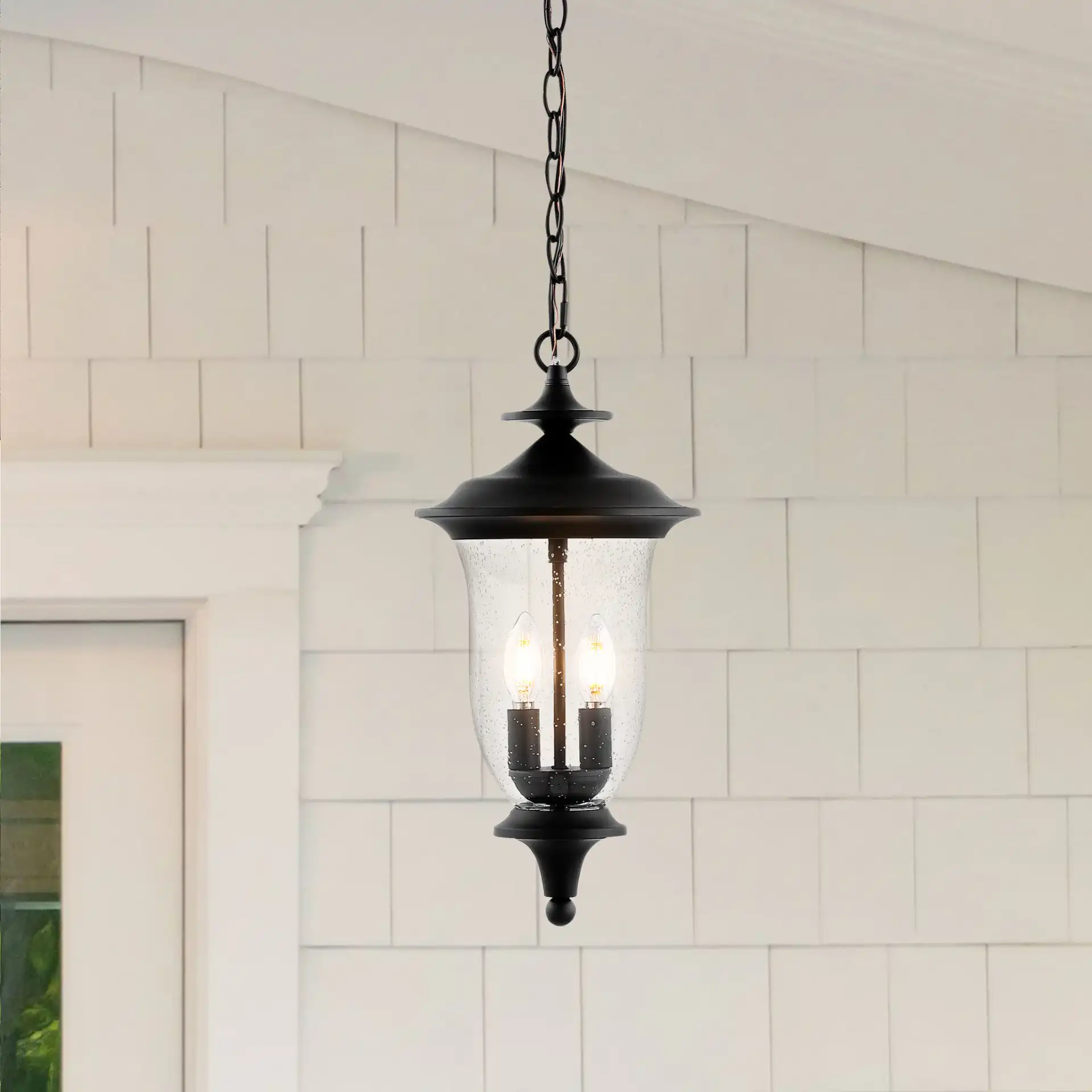Dowell Outdoor Pendant in Black in a styled room