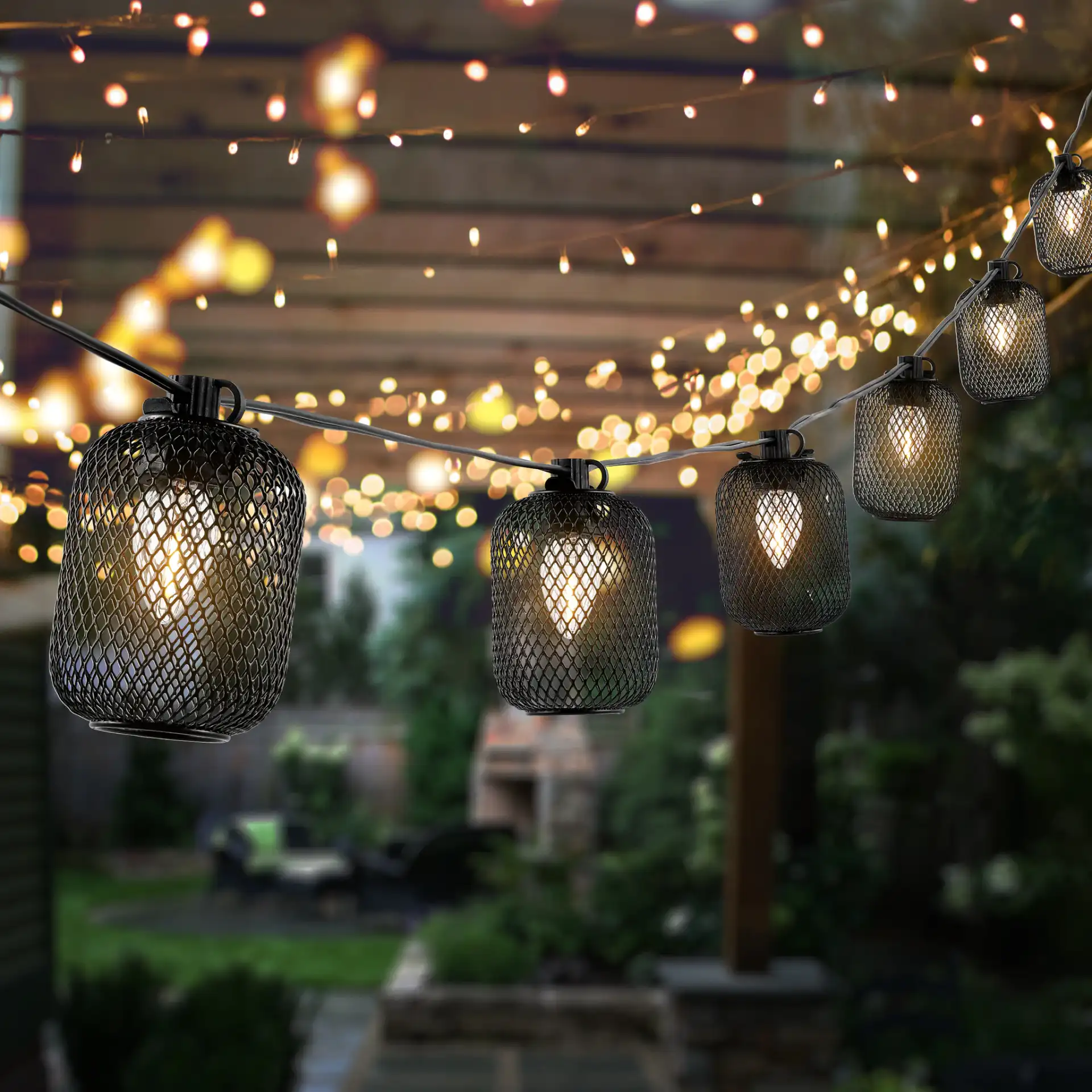 Jepsen Led Outdoor String Light in Black in a styled room