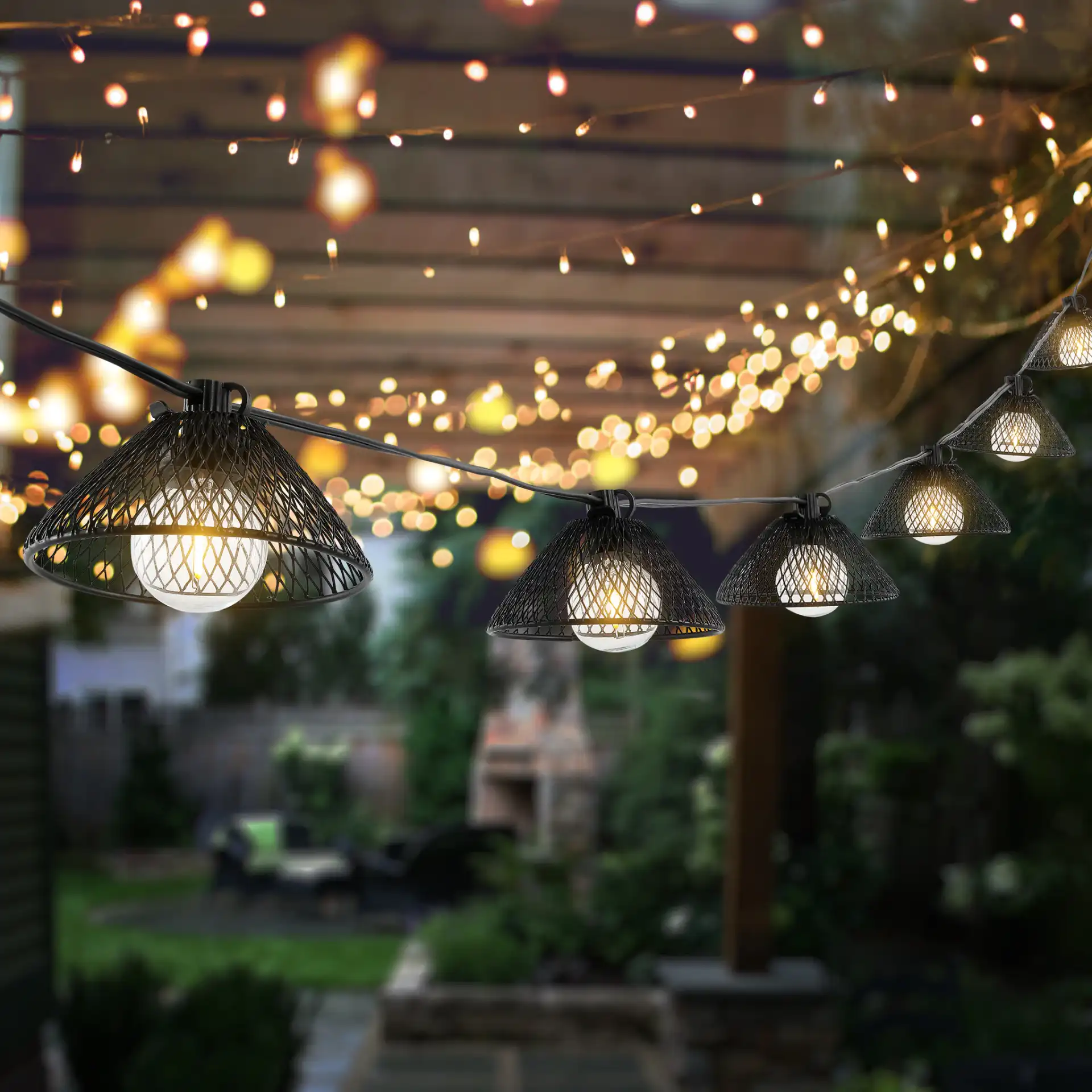 Junia Led Outdoor String Light in Black in a styled room