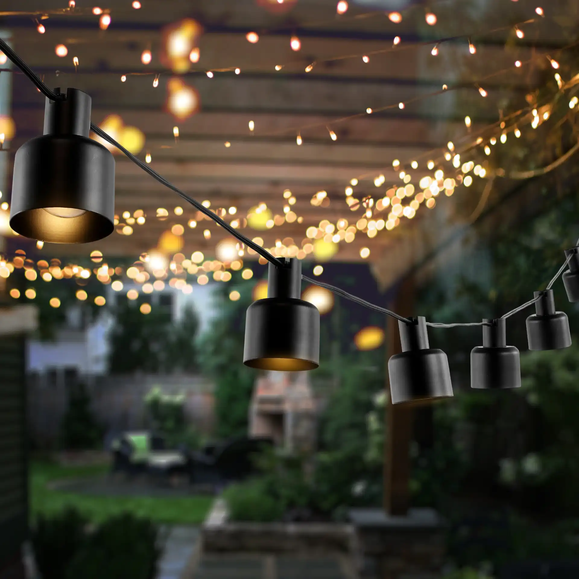 Adaner Led Outdoor String Lights in Black in a styled room