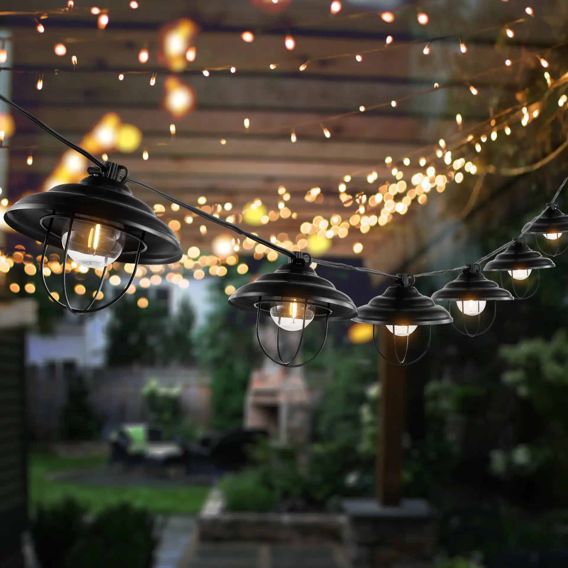 Aislin Led Outdoor String Lights in Black in a styled room
