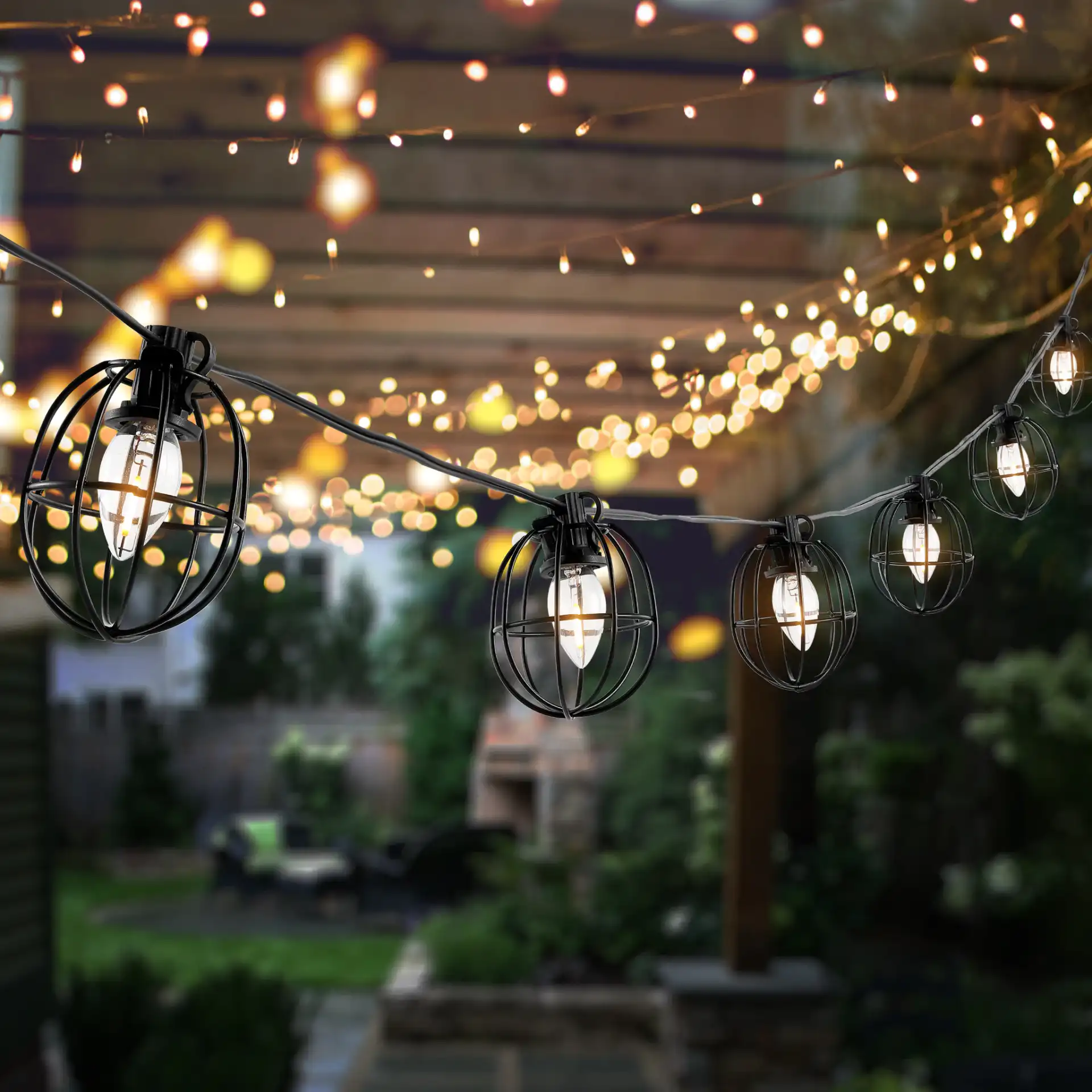 Garnet Led Outdoor String Light in Black in a styled room