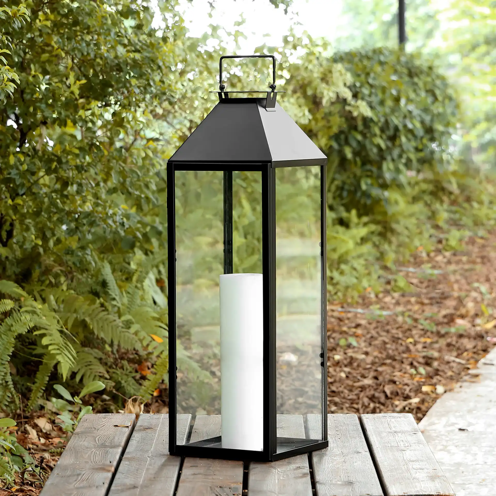Ruane Outdoor Lantern in Black in a styled room