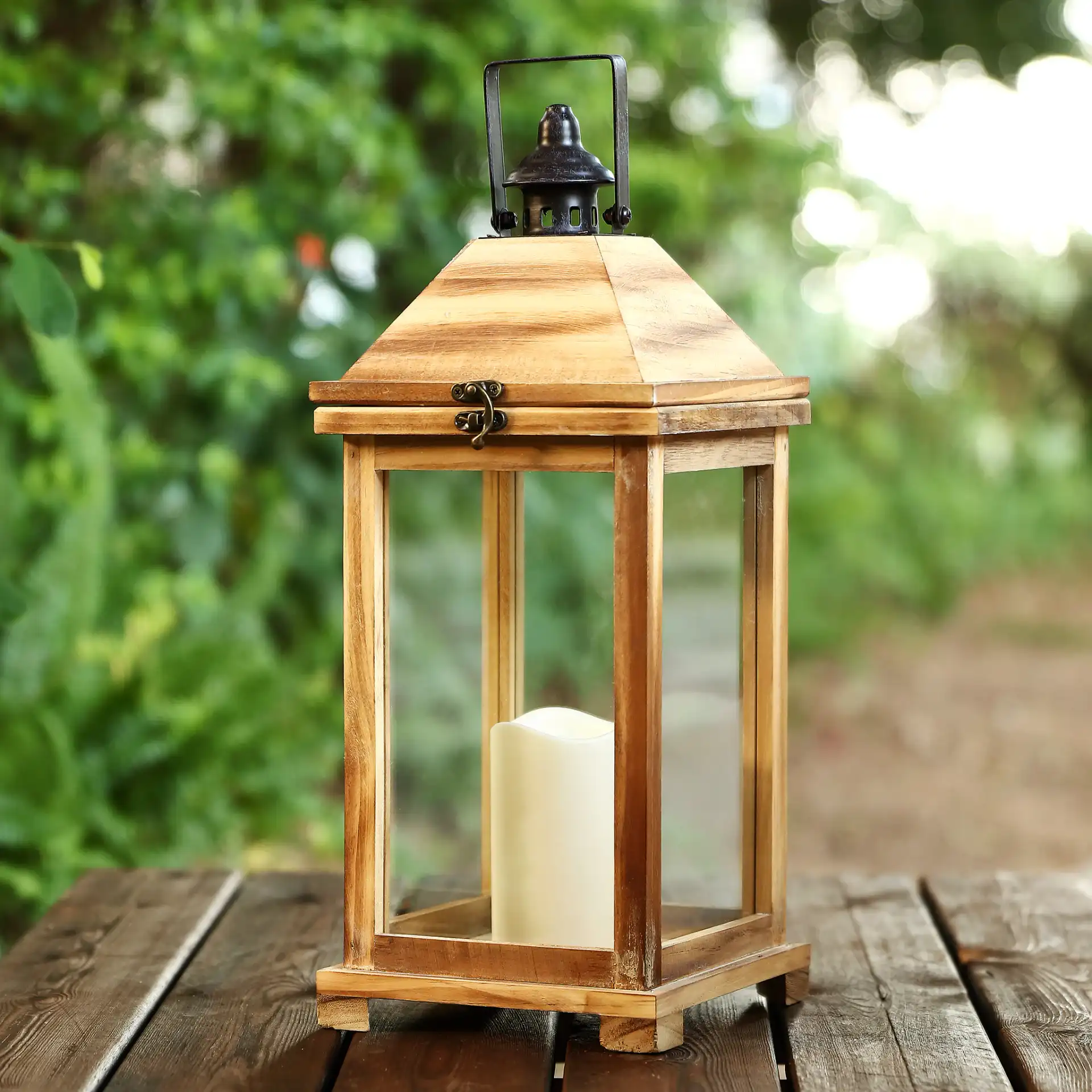 Elida Outdoor Lantern in Brown in a styled room