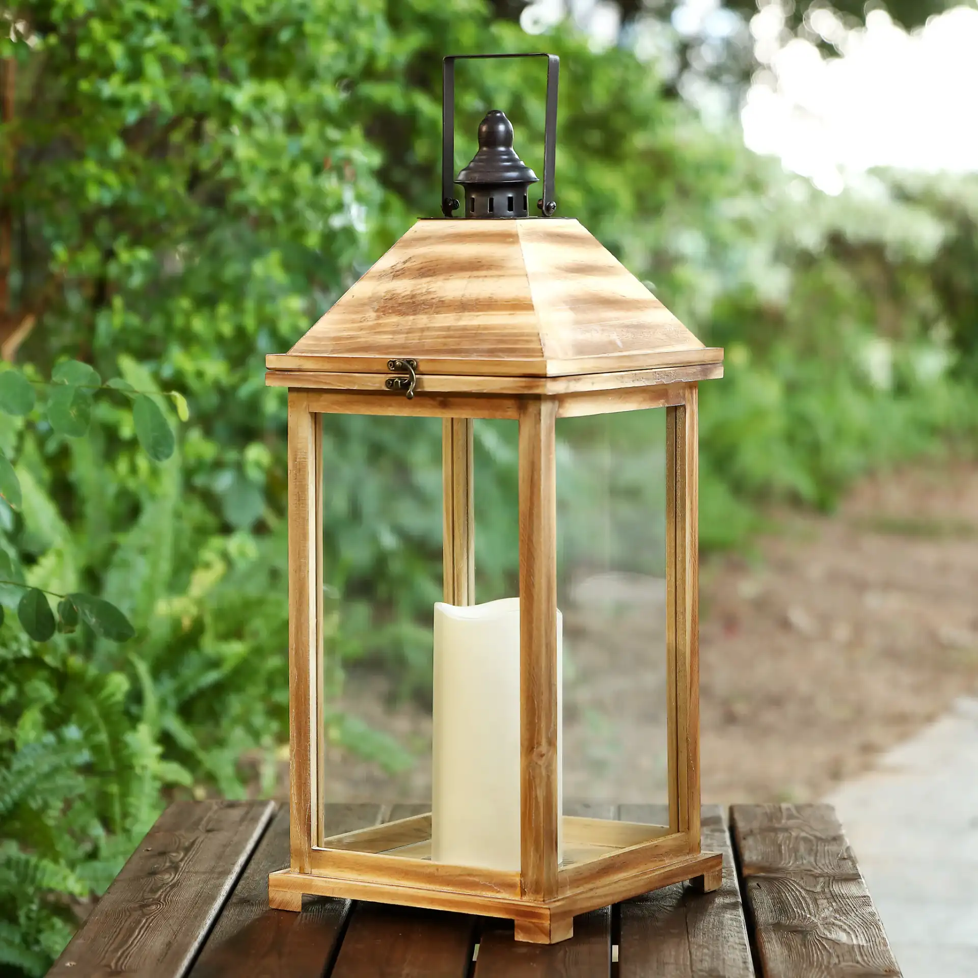 Elida Outdoor Lantern in Brown in a styled room