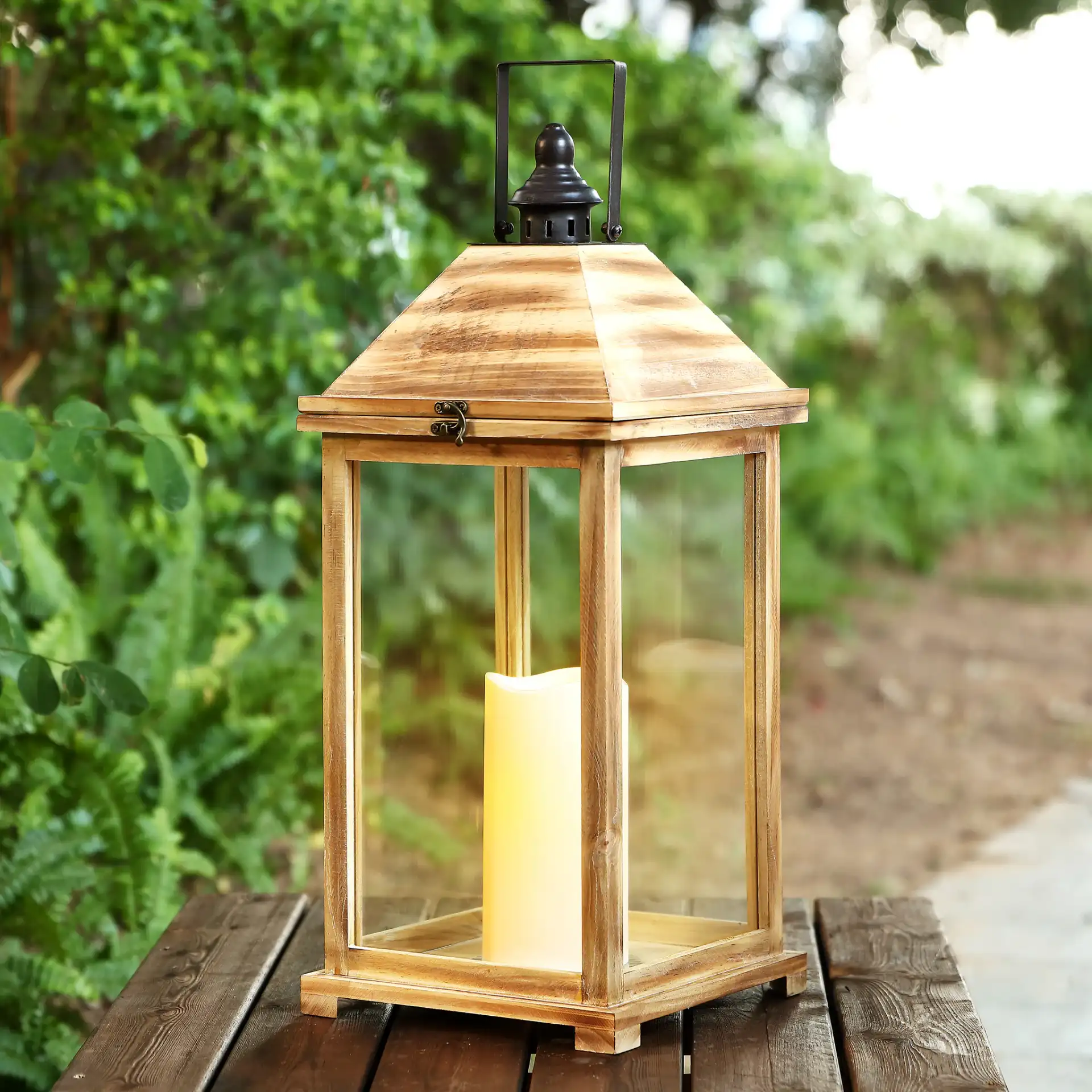 Elida Outdoor Lantern in Brown in a styled room