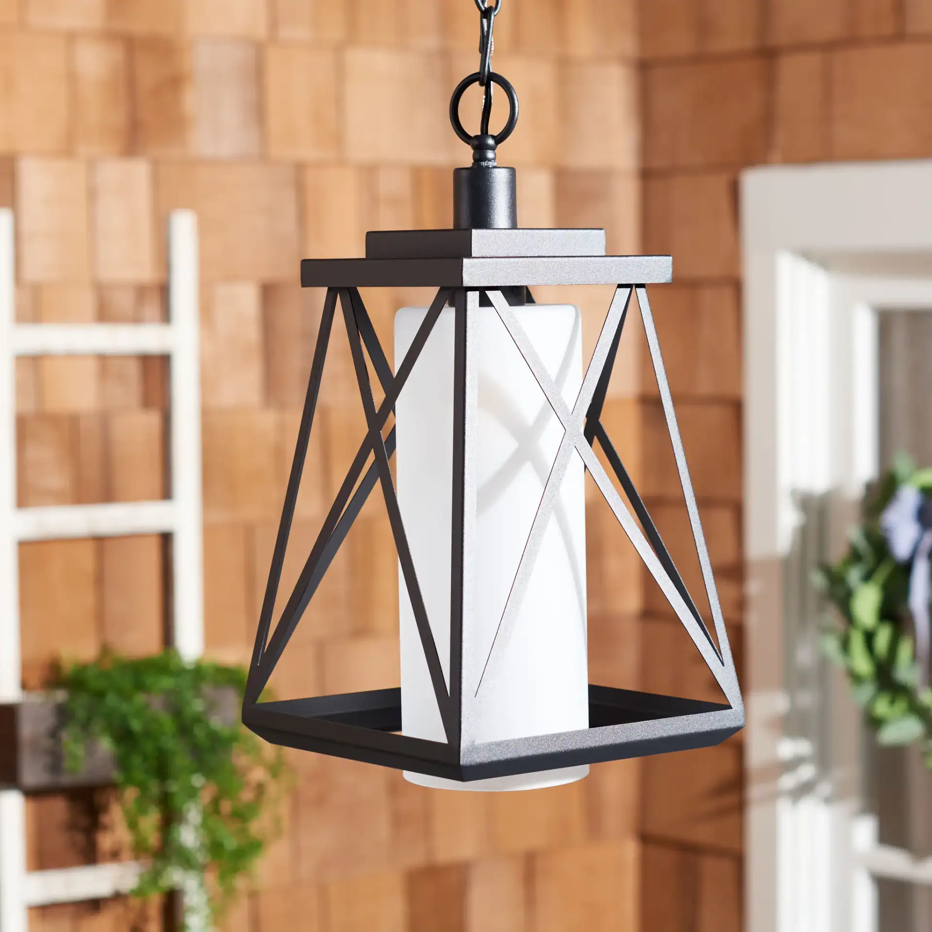 Braith Outdoor Pendant in Black in a styled room