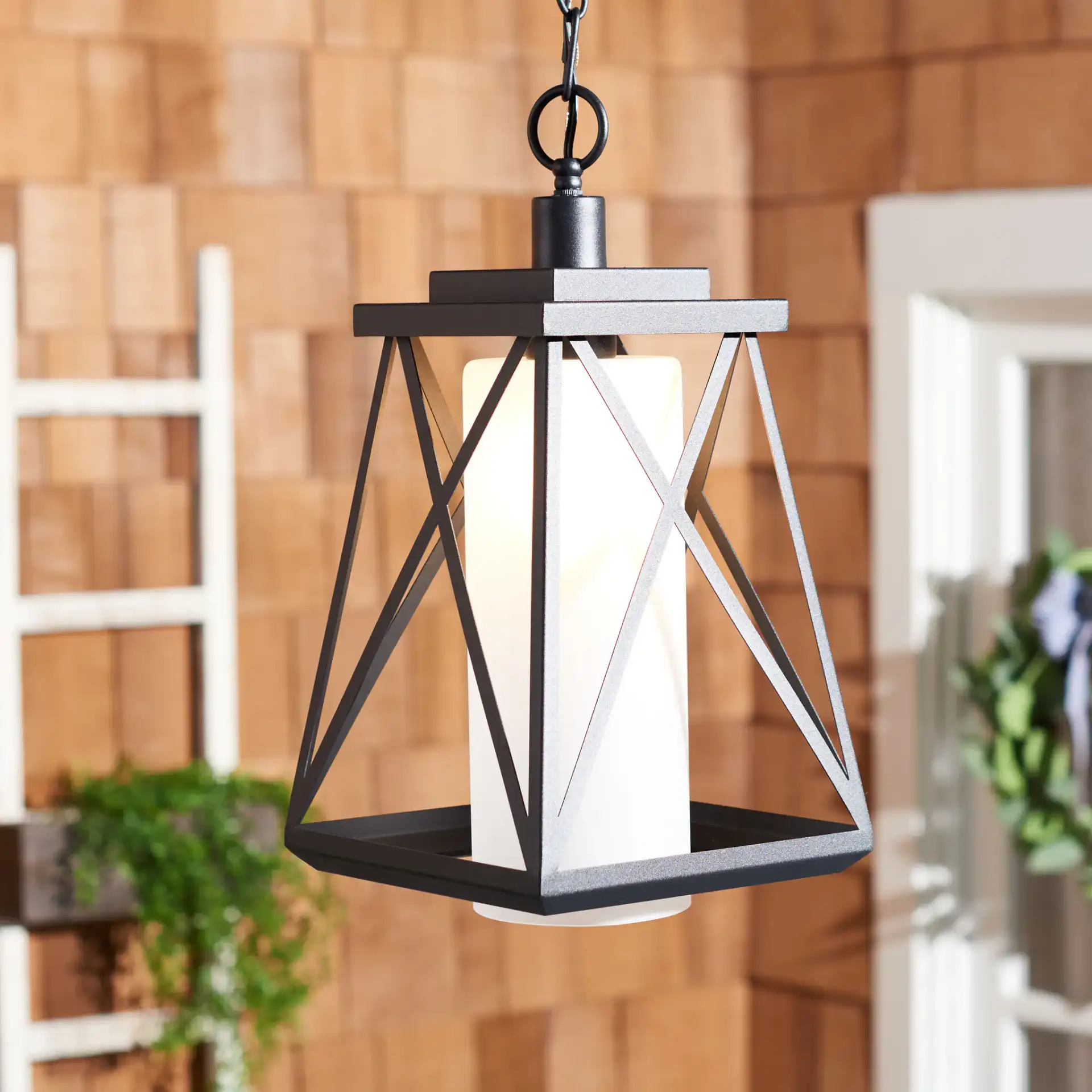 Braith Outdoor Pendant in Black in a styled room