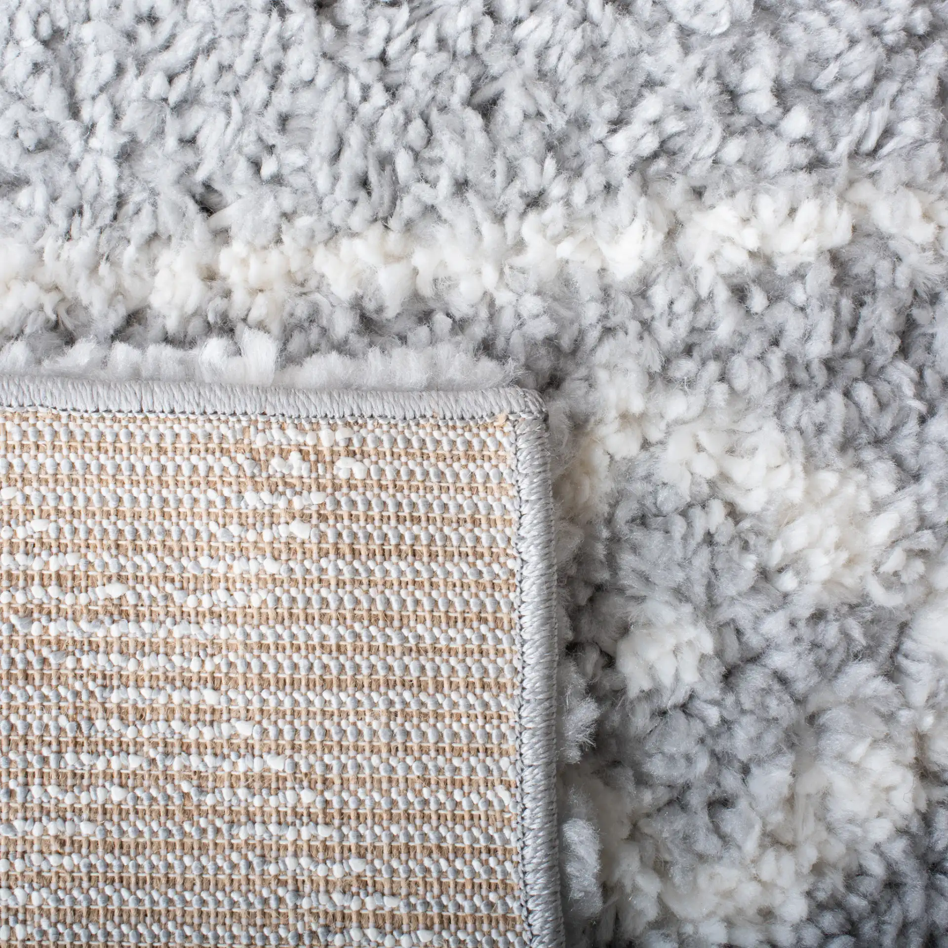 Parma Banded Moroccan Shag Rug in Gray / Ivory in a styled room