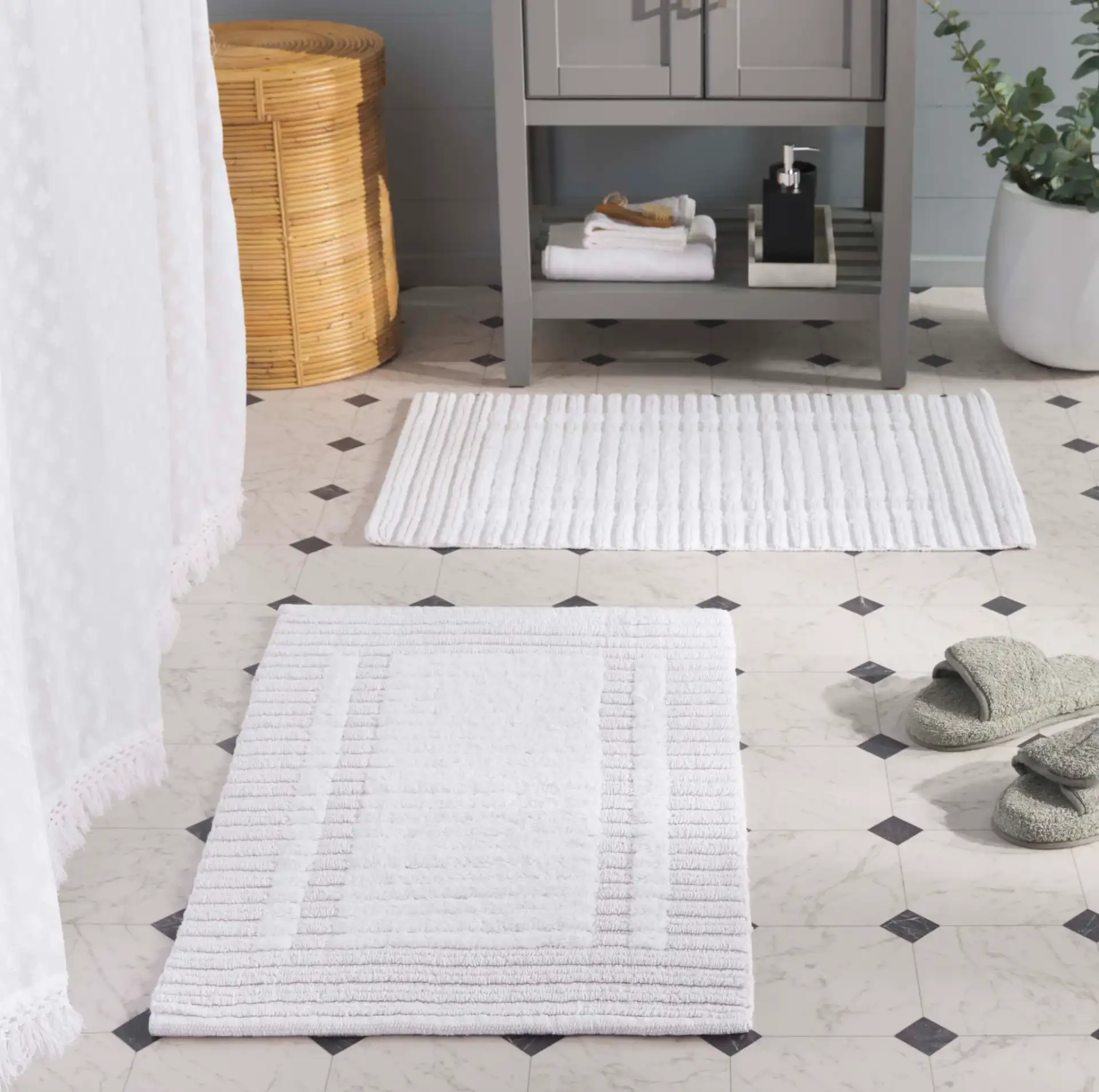 Greyson Striped Cotton Bathmat (Set of 2) in White in a styled room