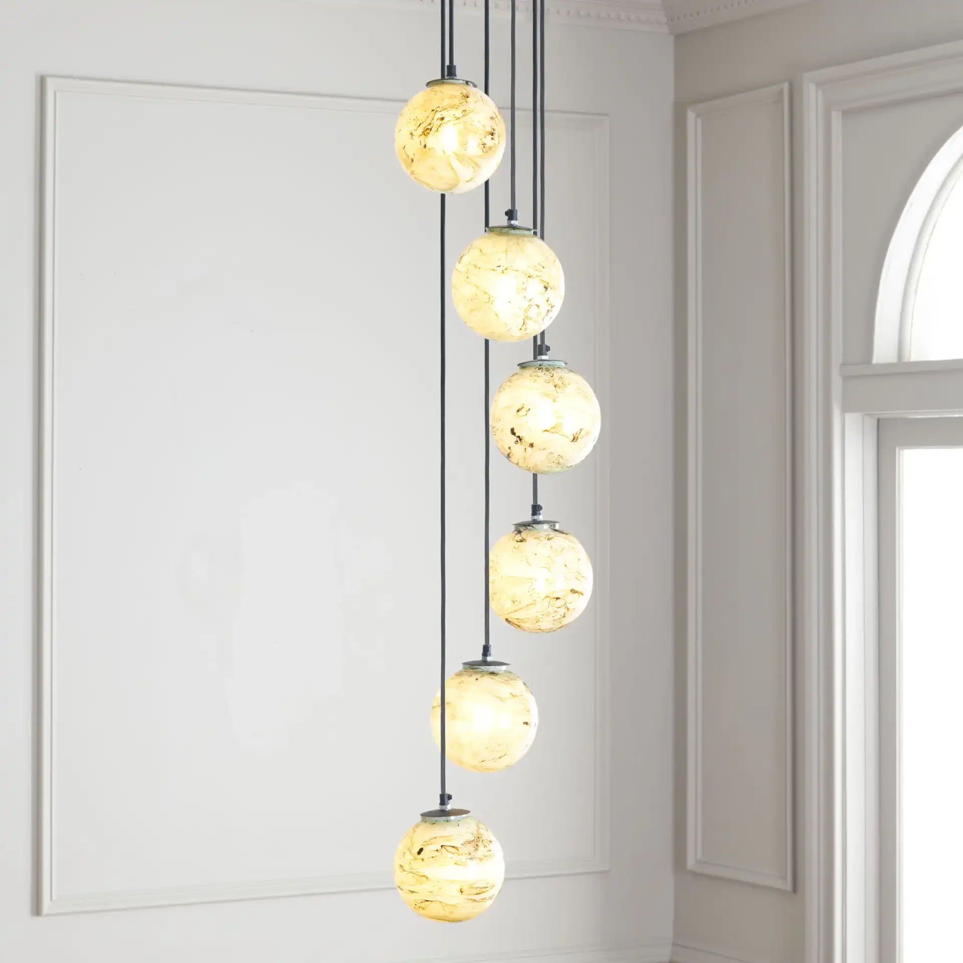 Hallie Six-Light Pendant in Black / Multicolor in a styled room