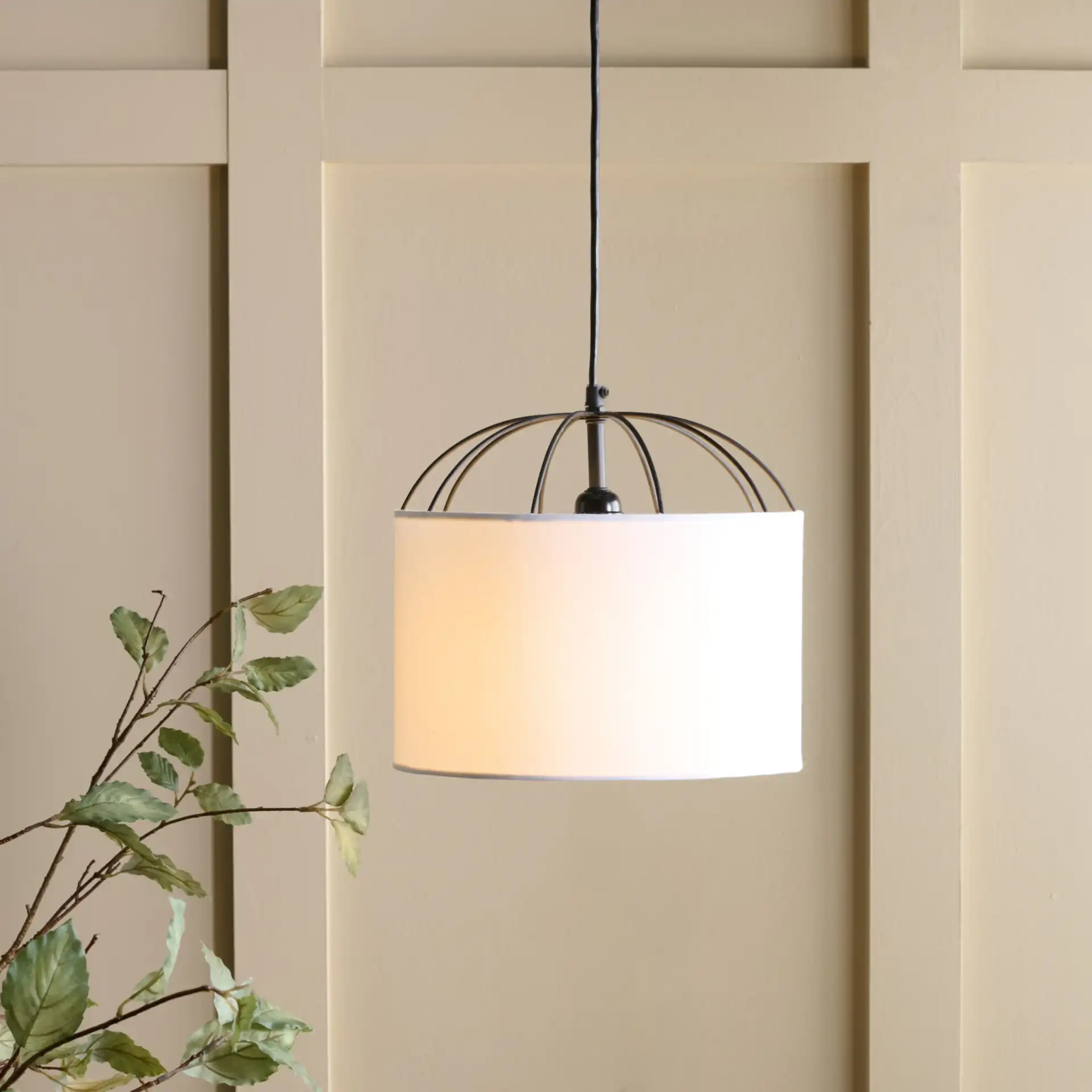 Noomi Pendant in White / Black in a styled room