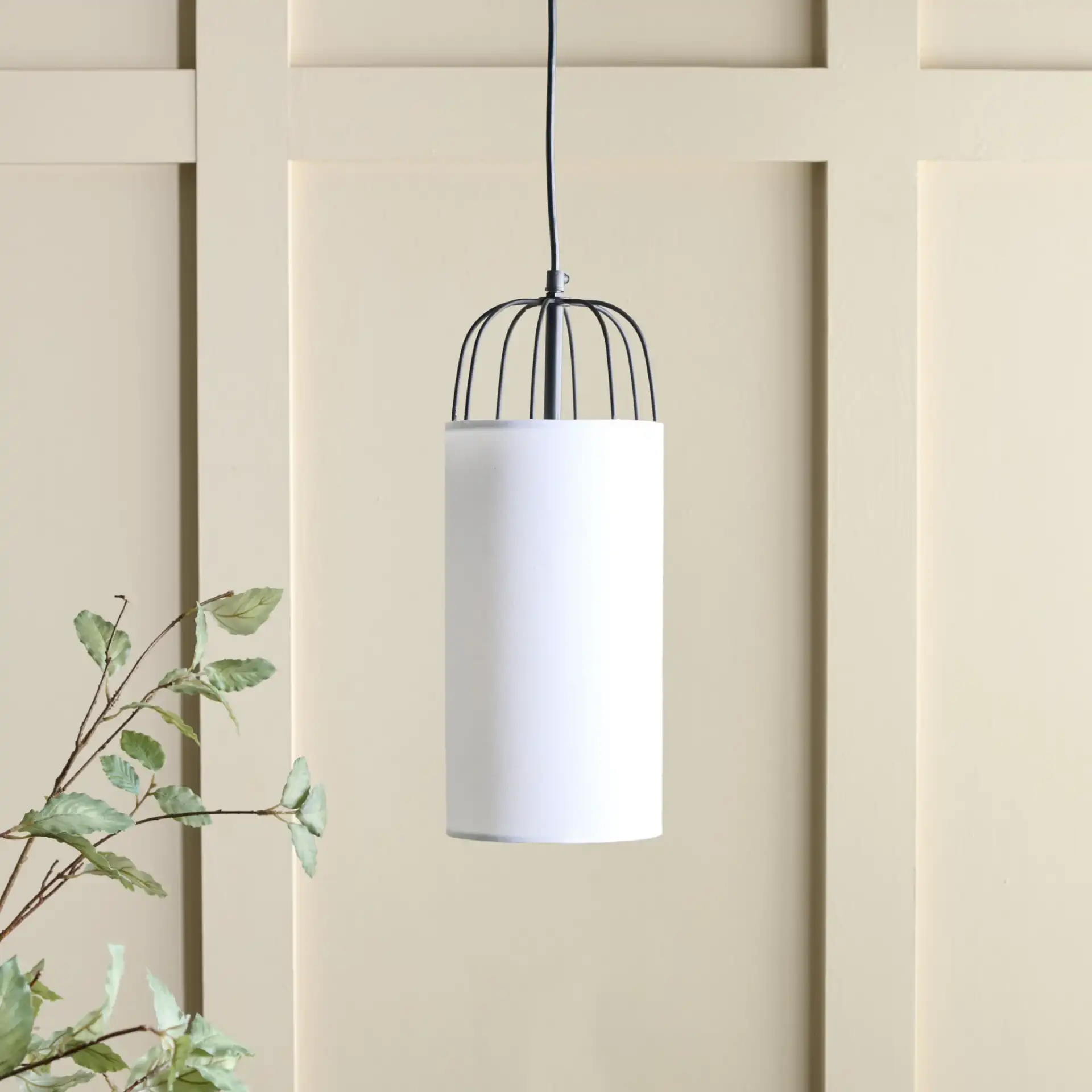 Navi Pendant in White / Black in a styled room