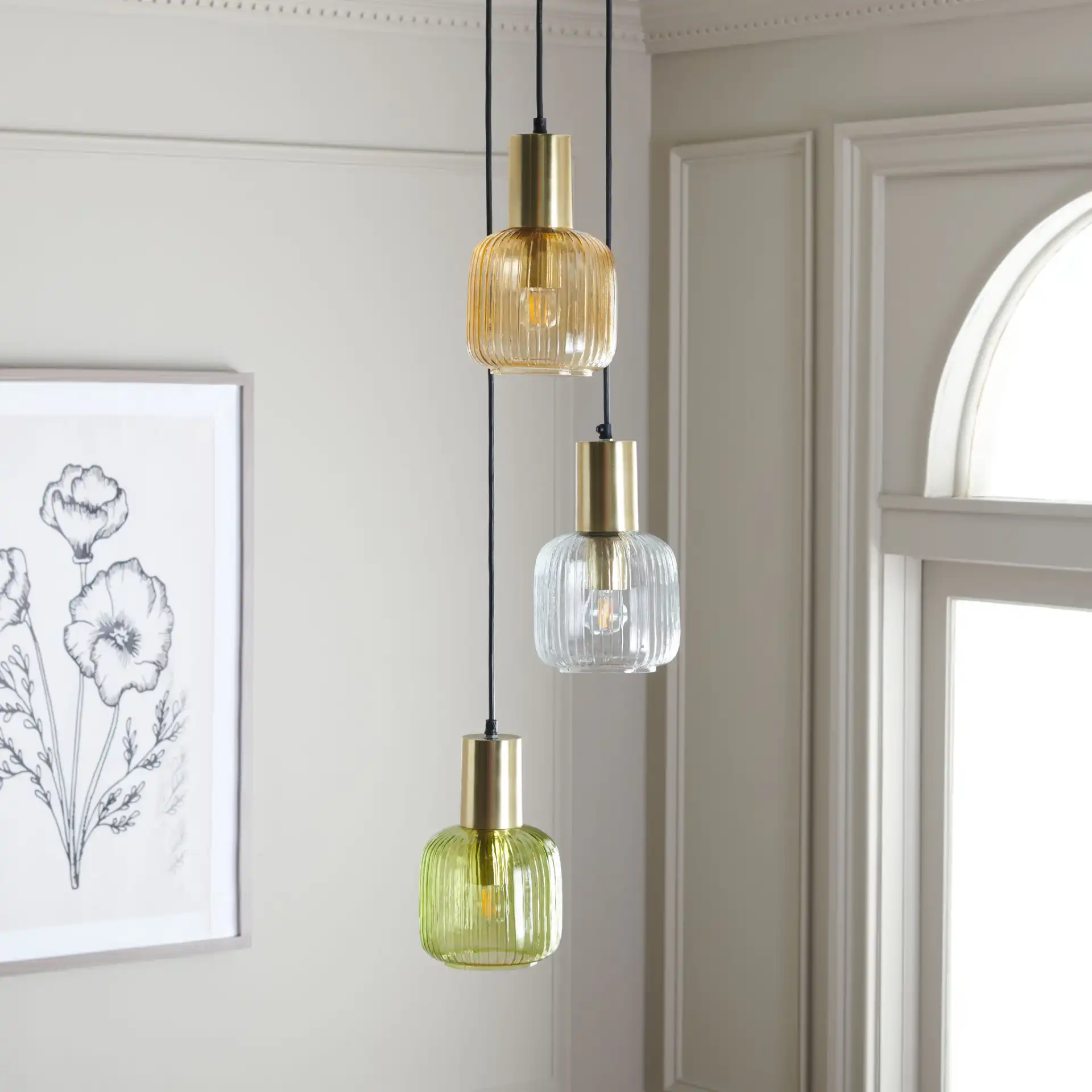 Rhea Three-Light Pendant in Multicolor / Gold in a styled room