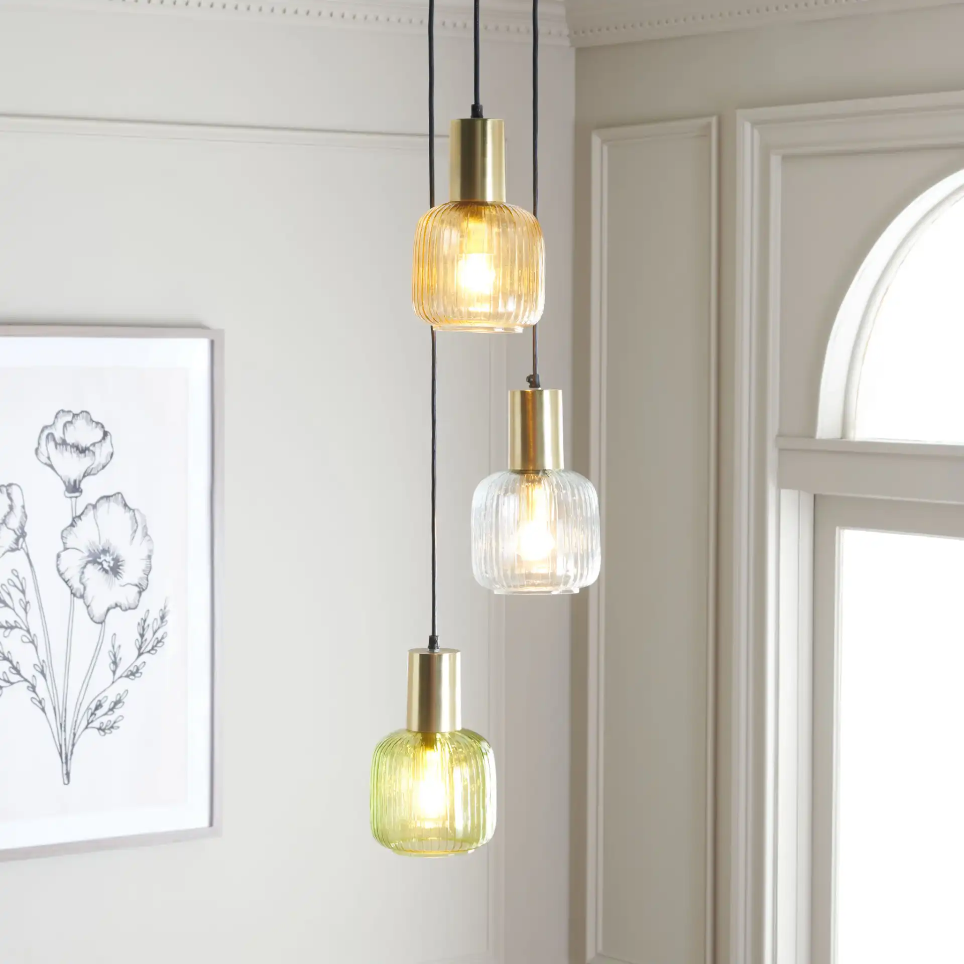 Rhea Three-Light Pendant in Multicolor / Gold in a styled room