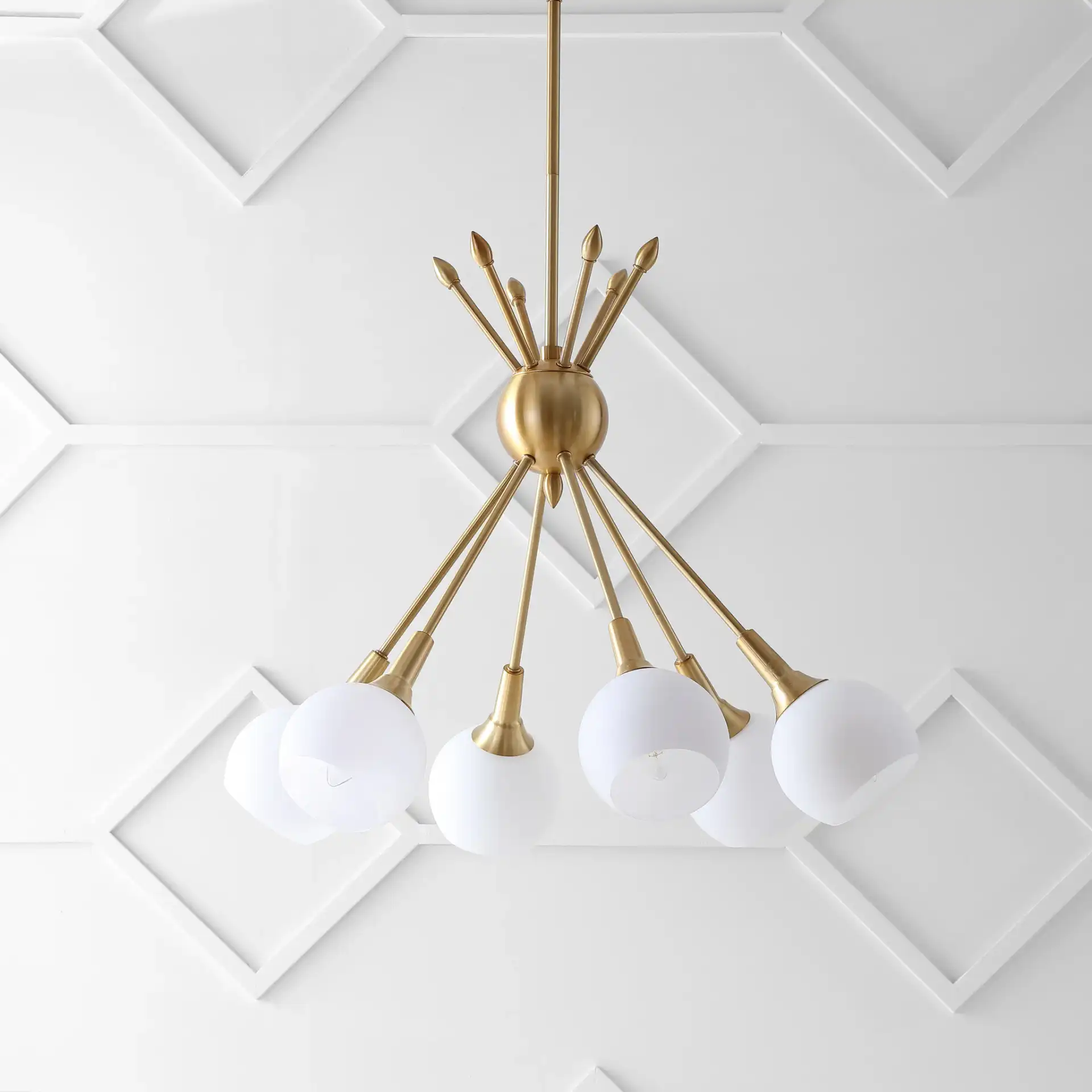 Justine Six-Light Pendant in Brass Gold in a styled room