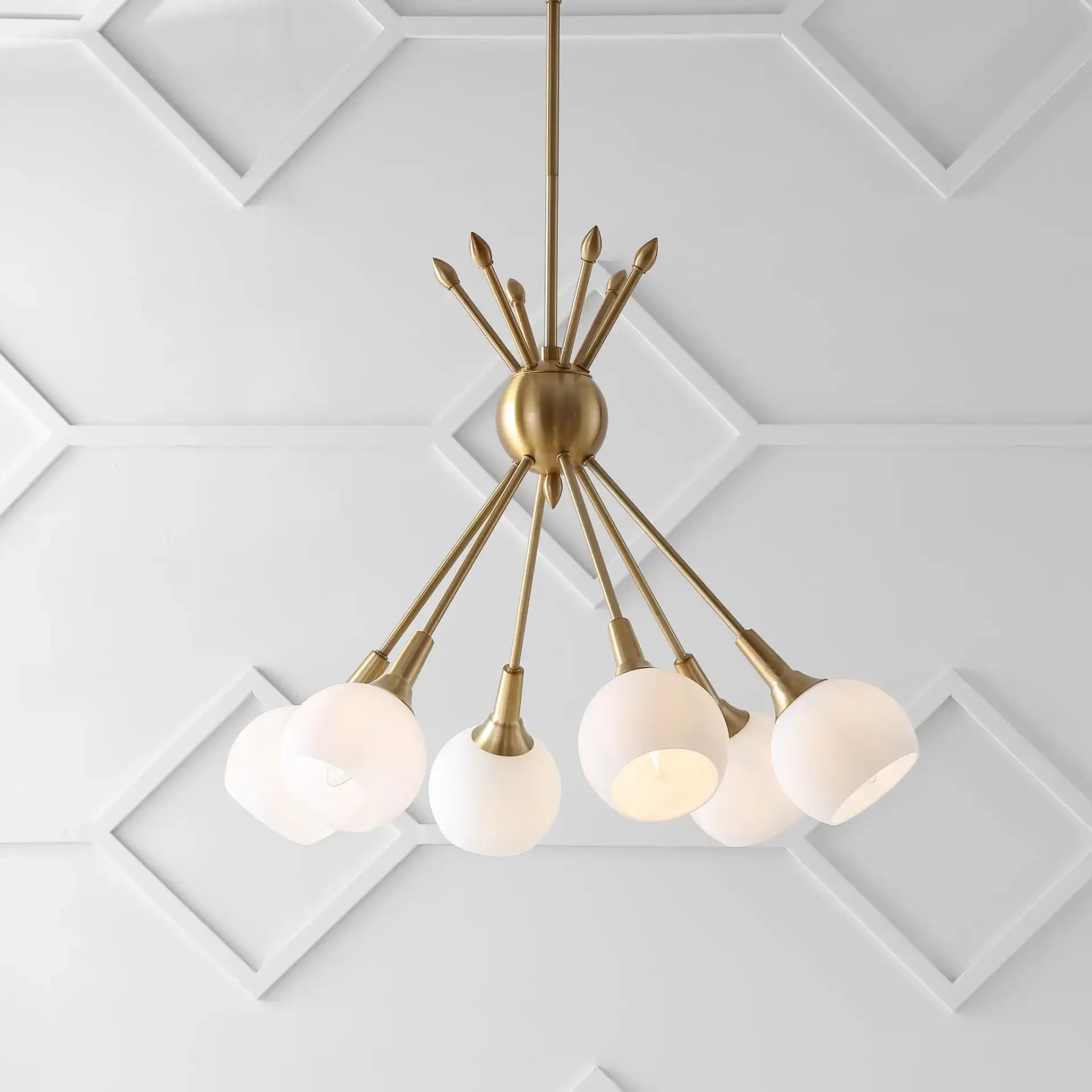 Justine Six-Light Pendant in Brass Gold in a styled room