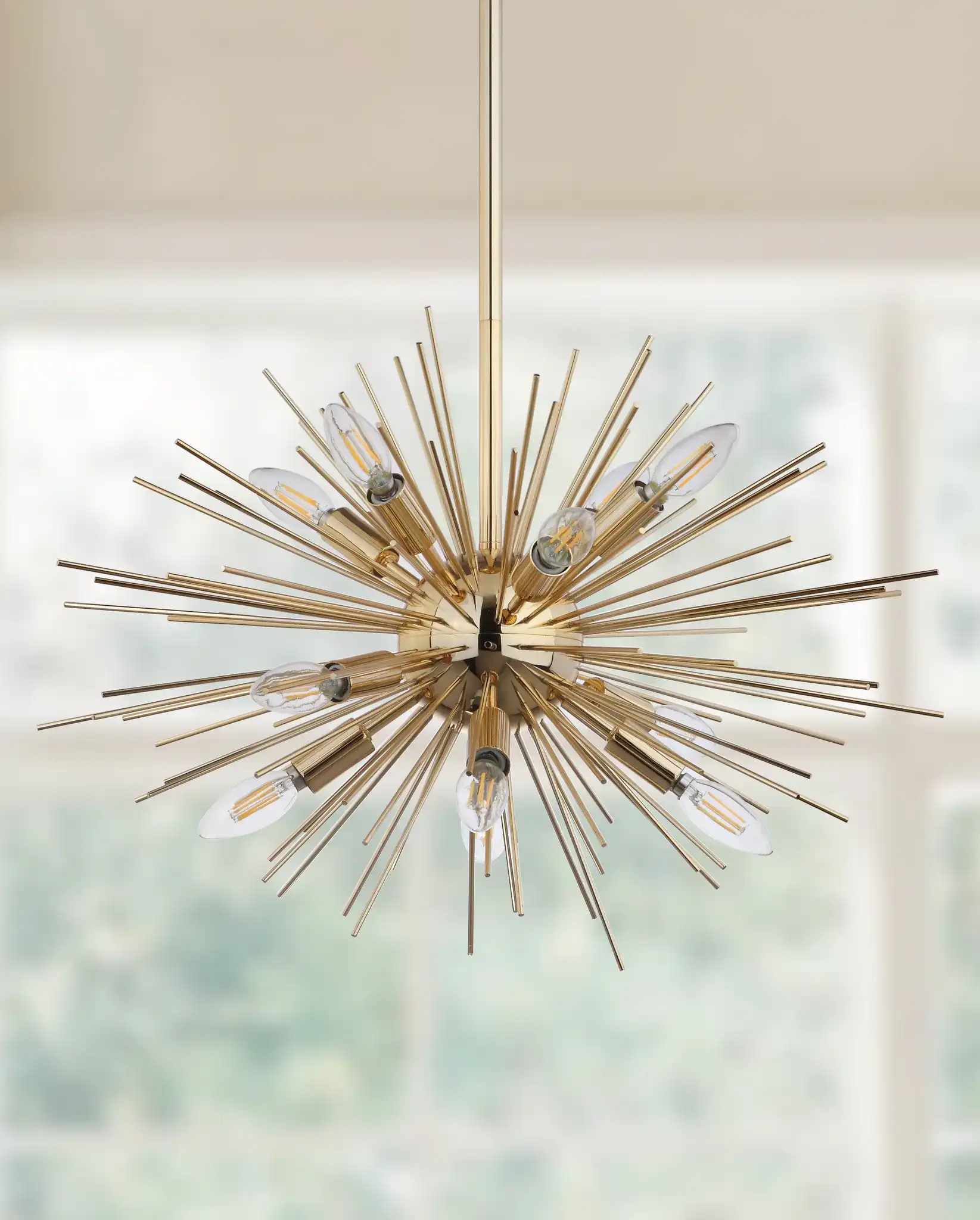 Zadie Twelve-Light Pendant in Gold in a styled room