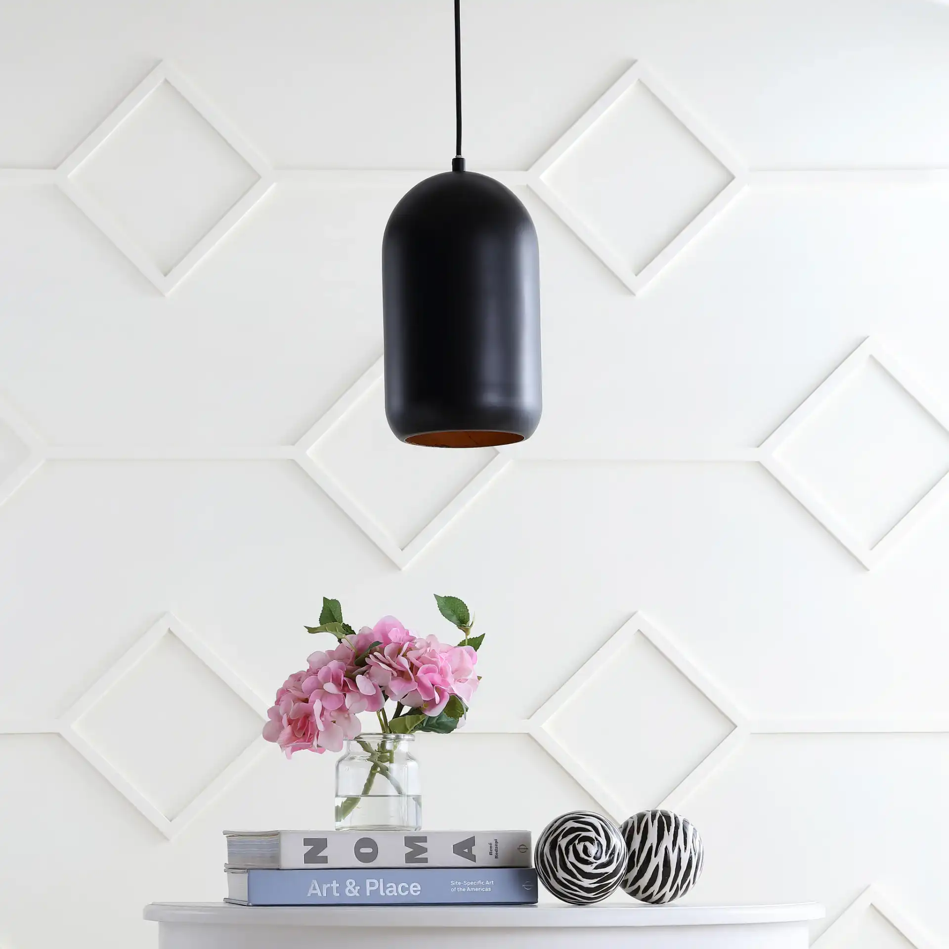 Carisir Pendant in Black in a styled room