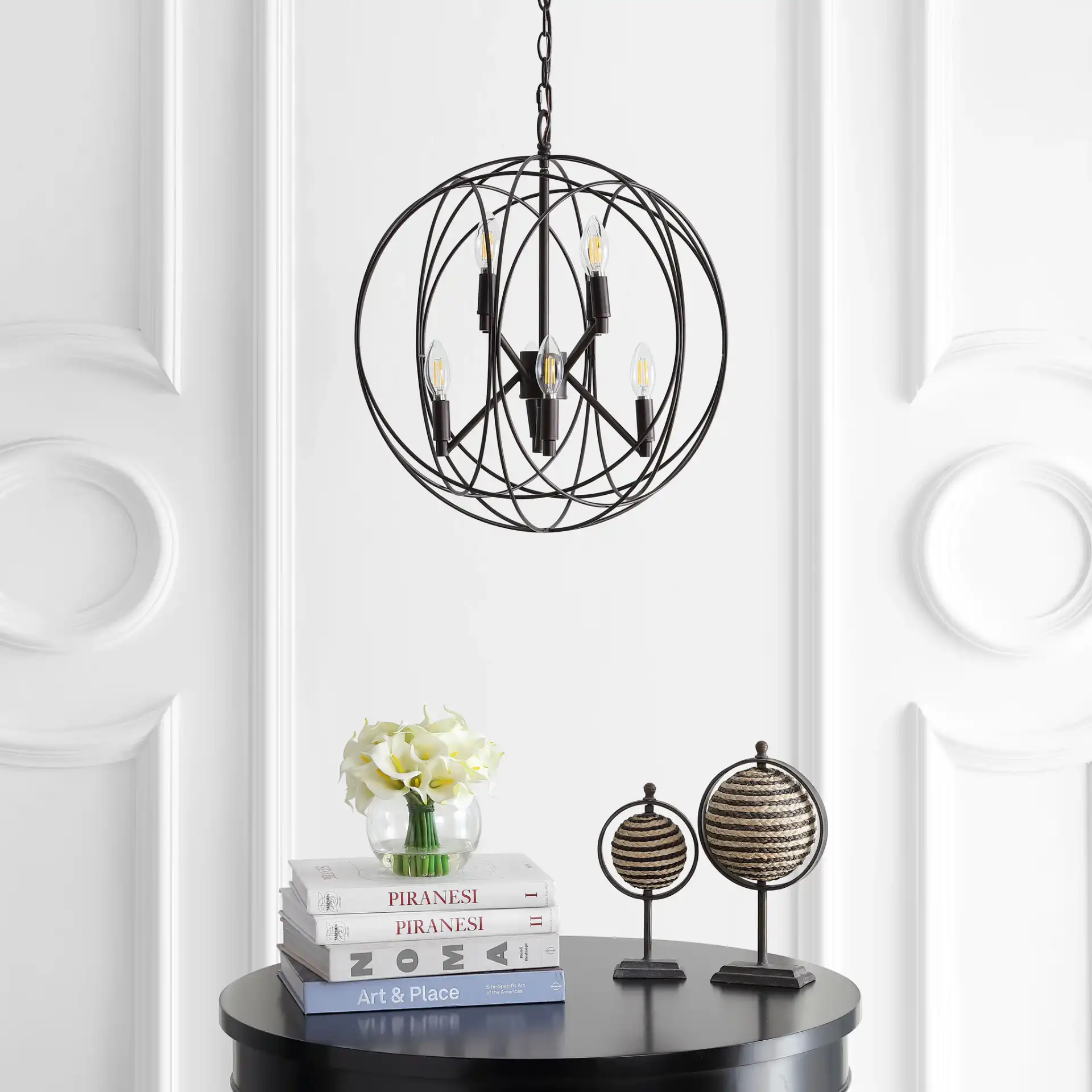 Raylon Eight-Light Pendant in Brass in a styled room