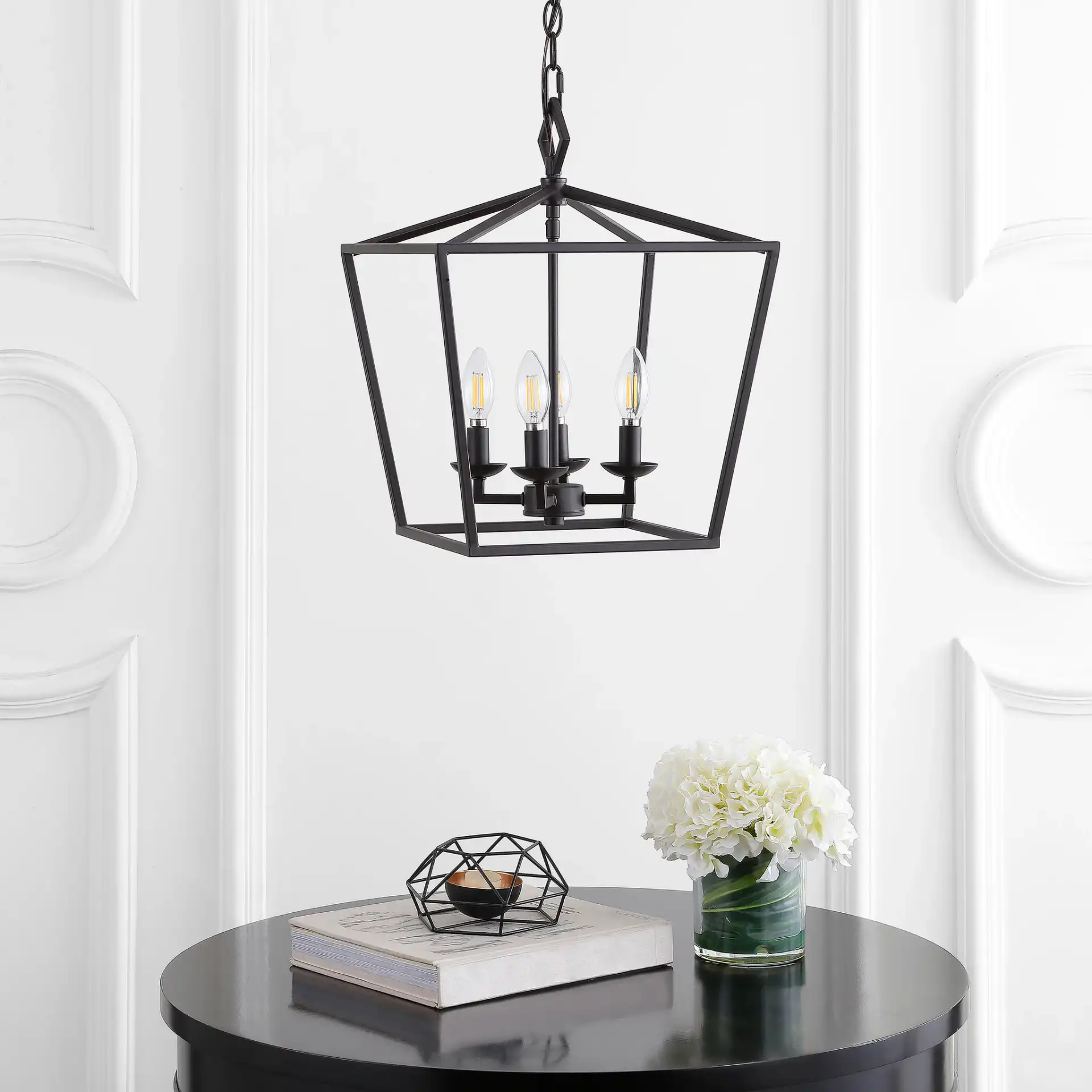 Rosalen Four-Light Pendant in Oil Rub Bronze in a styled room