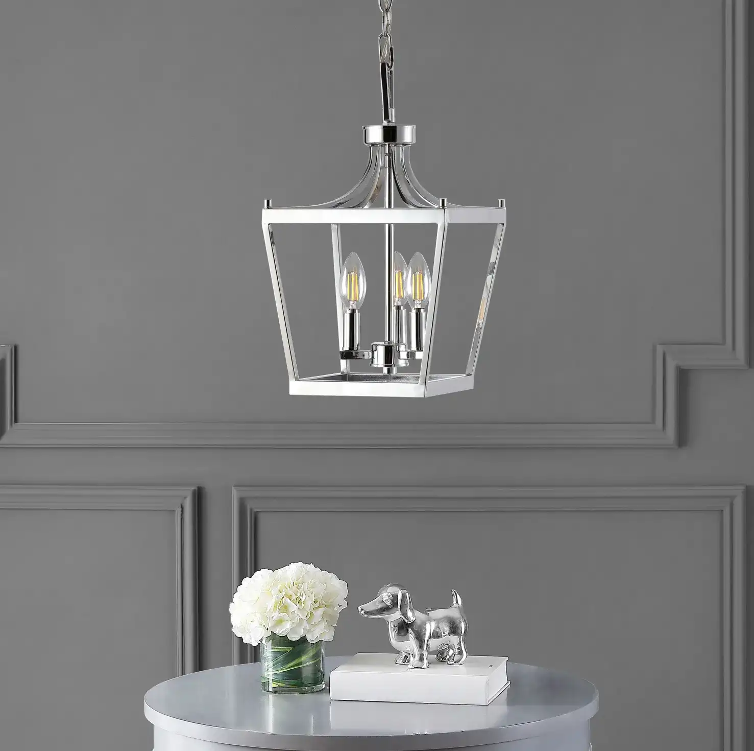 Larton Three-Light Pendant in Oil Rub Bronze in a styled room