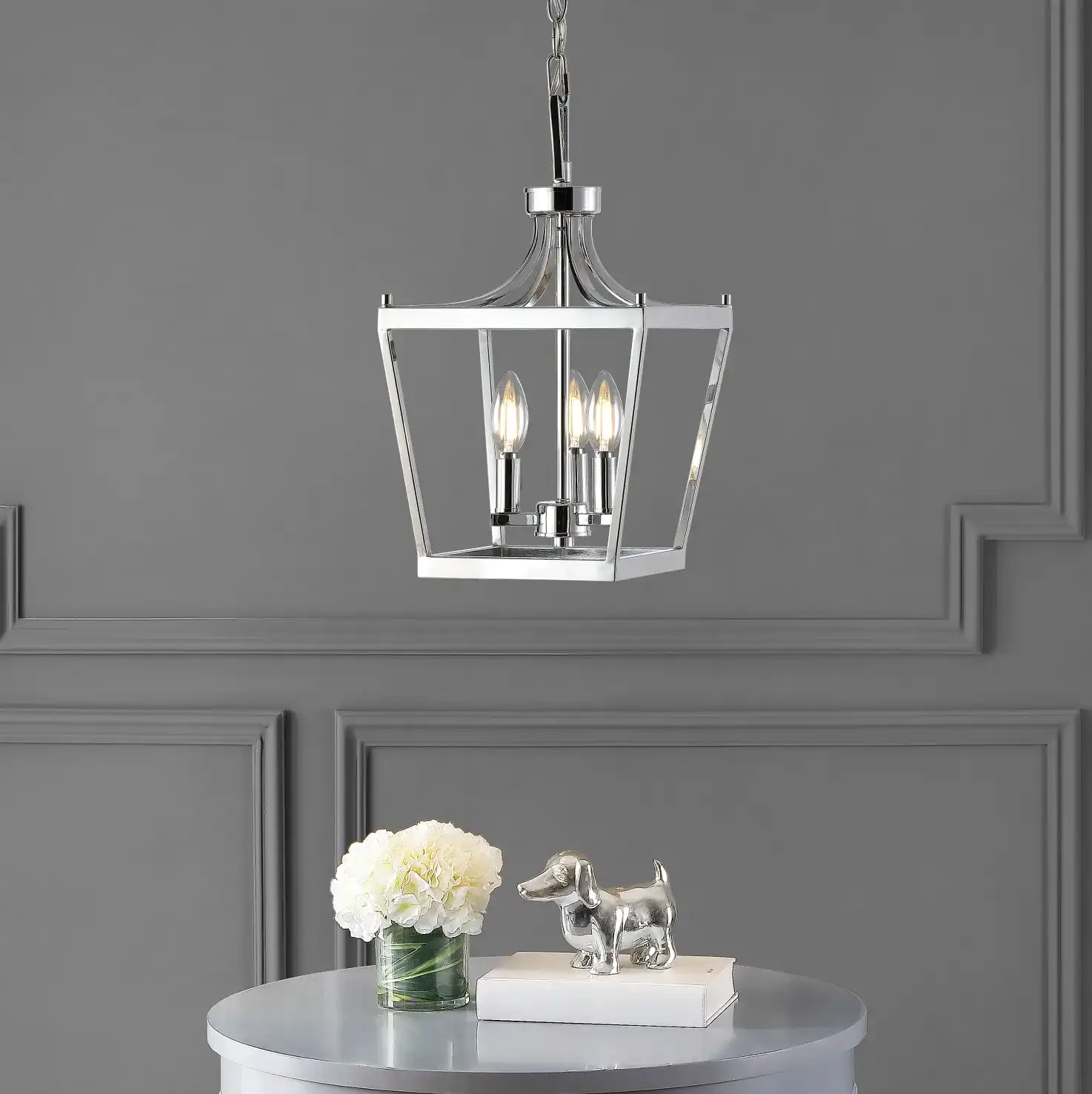 Larton Three-Light Pendant in Oil Rub Bronze in a styled room