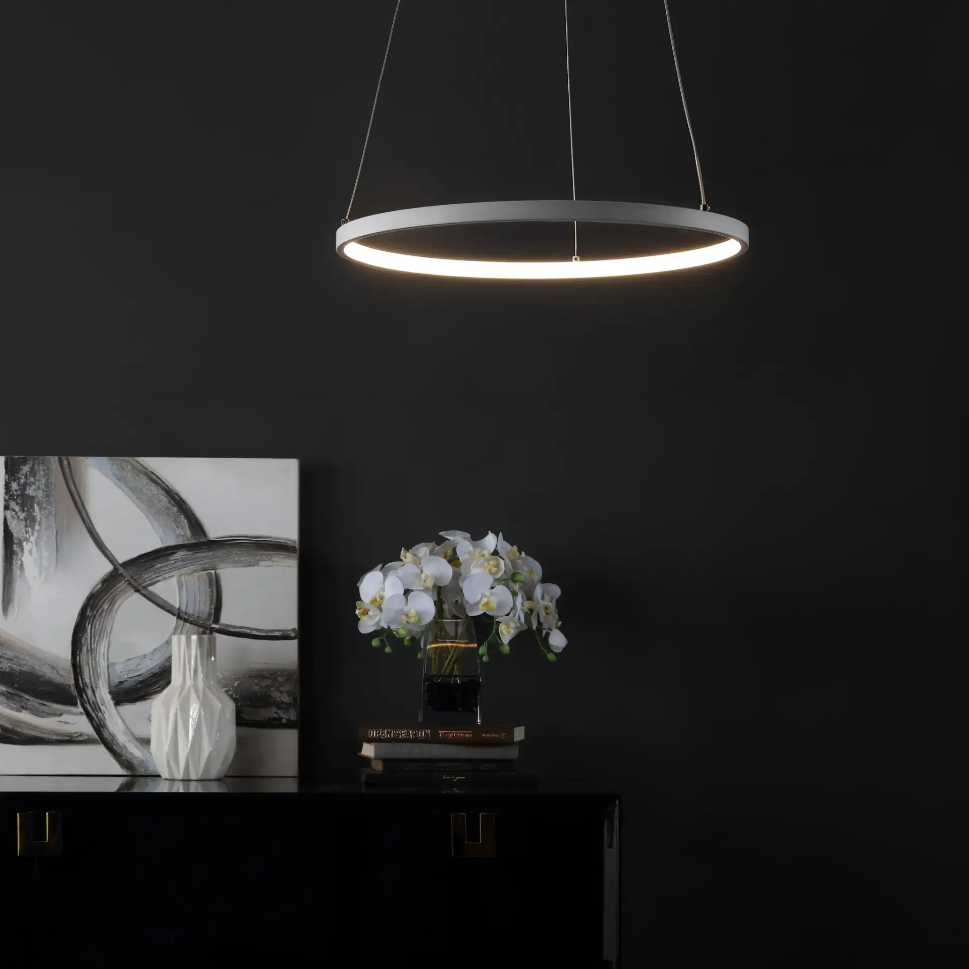 Bremi Led Pendant in White in a styled room