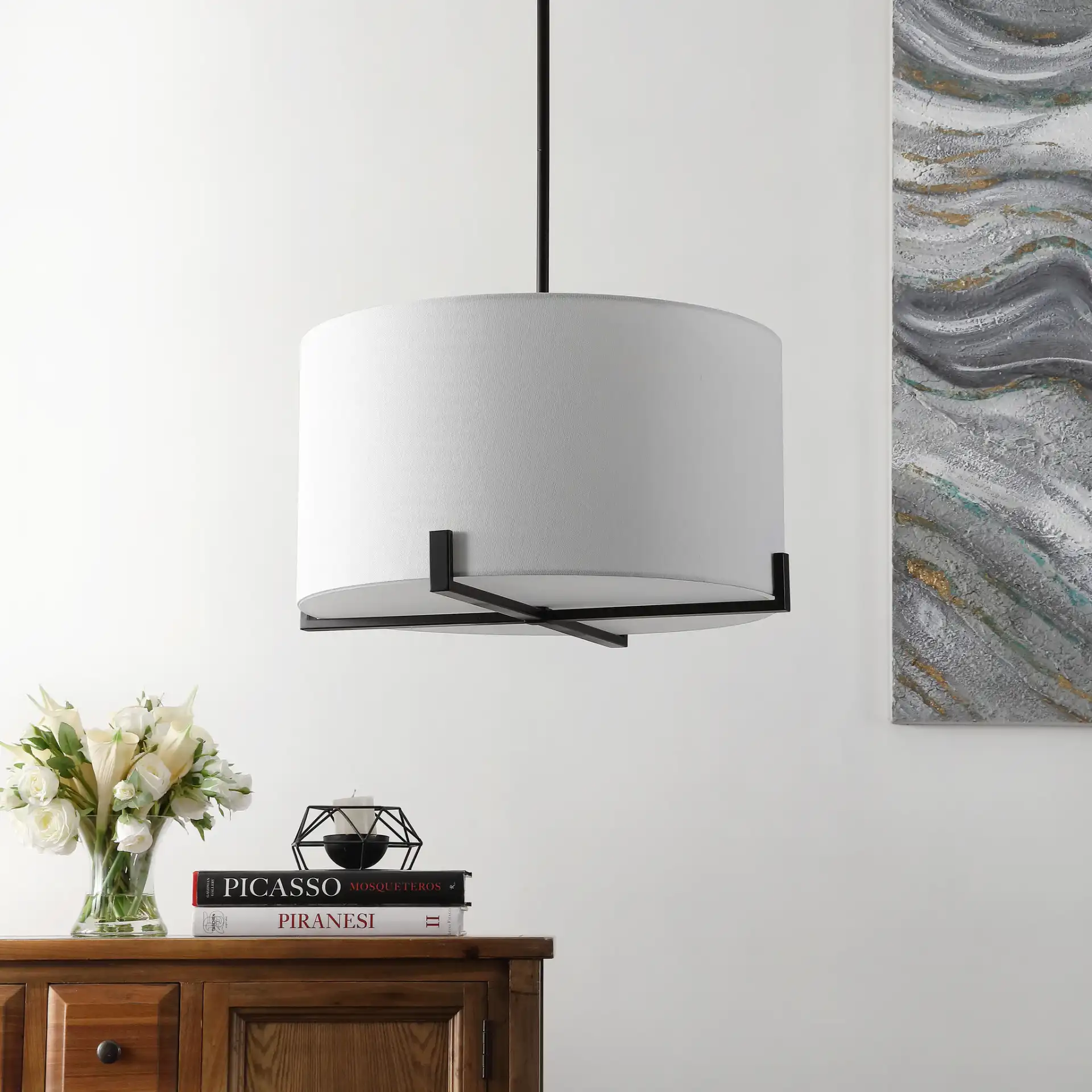 Tarlon Three-Light Pendant in Oil Rub Bronze in a styled room