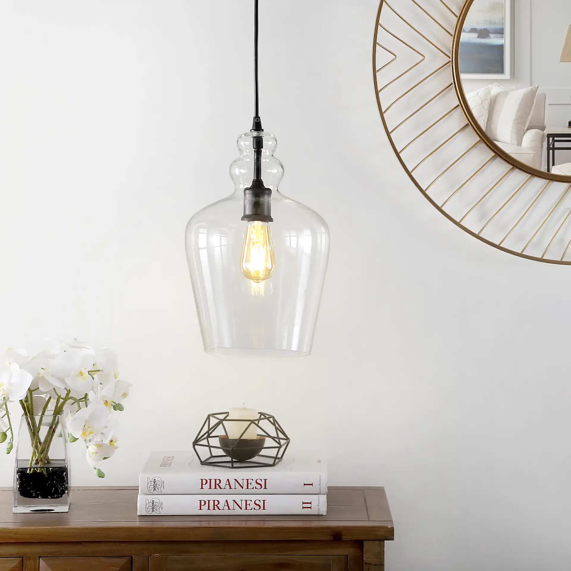 Catlen 9 Inch Pendant in Brass in a styled room