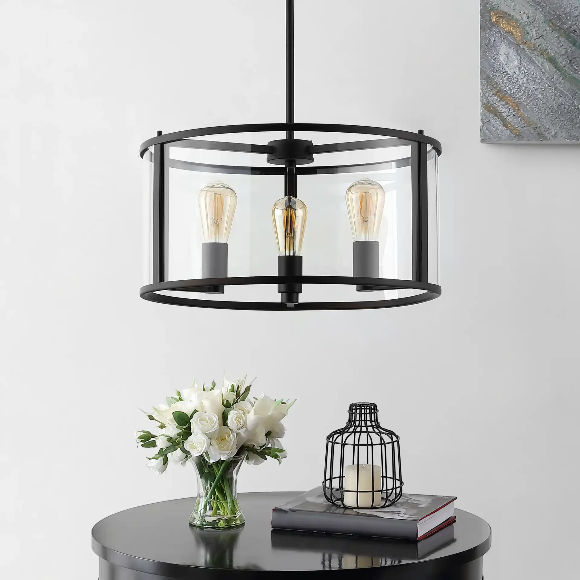 Manlen Three-Light Pendant in Bronze in a styled room