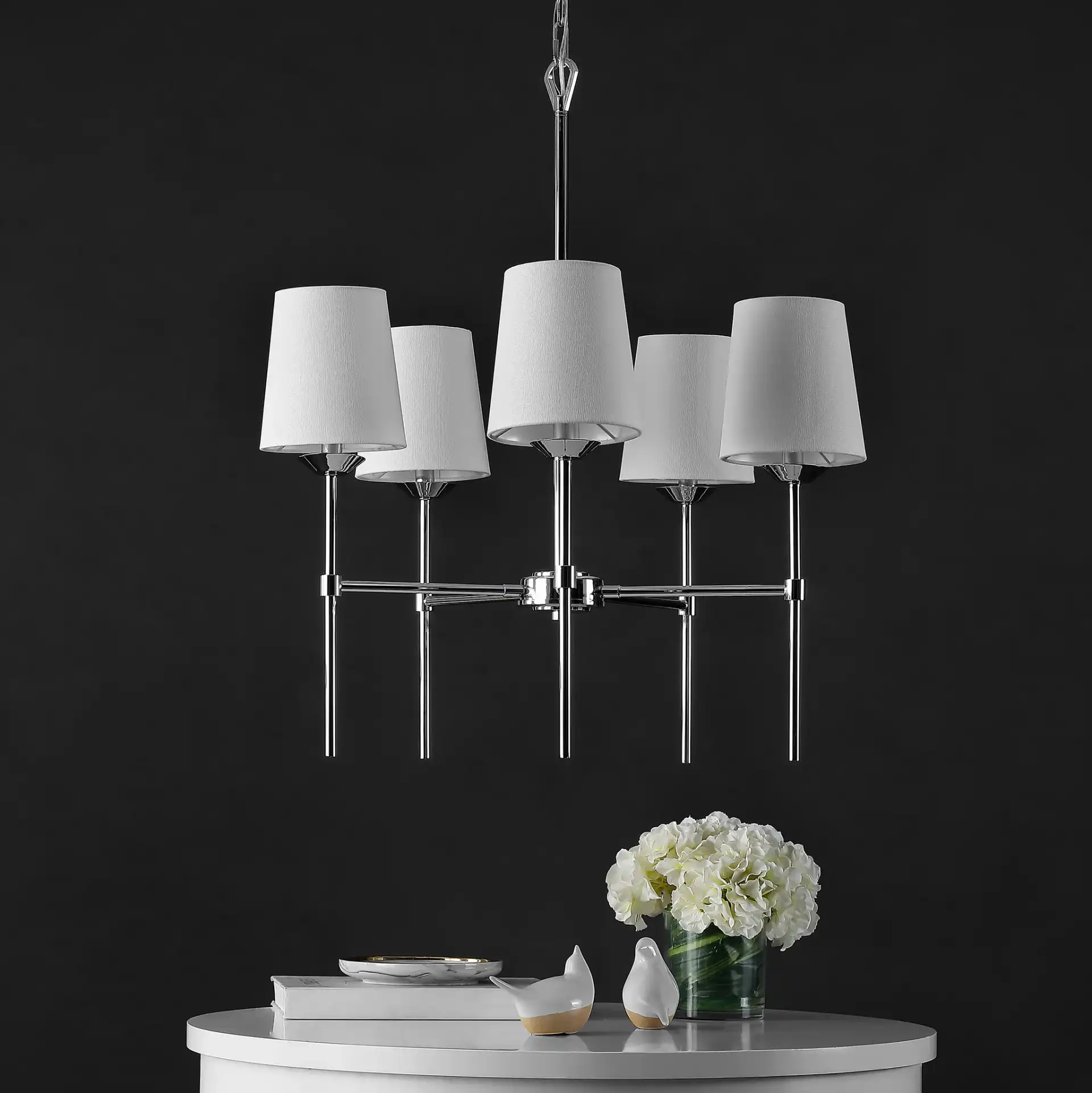 Dortra Five-Light Pendant in Chrome / White in a styled room